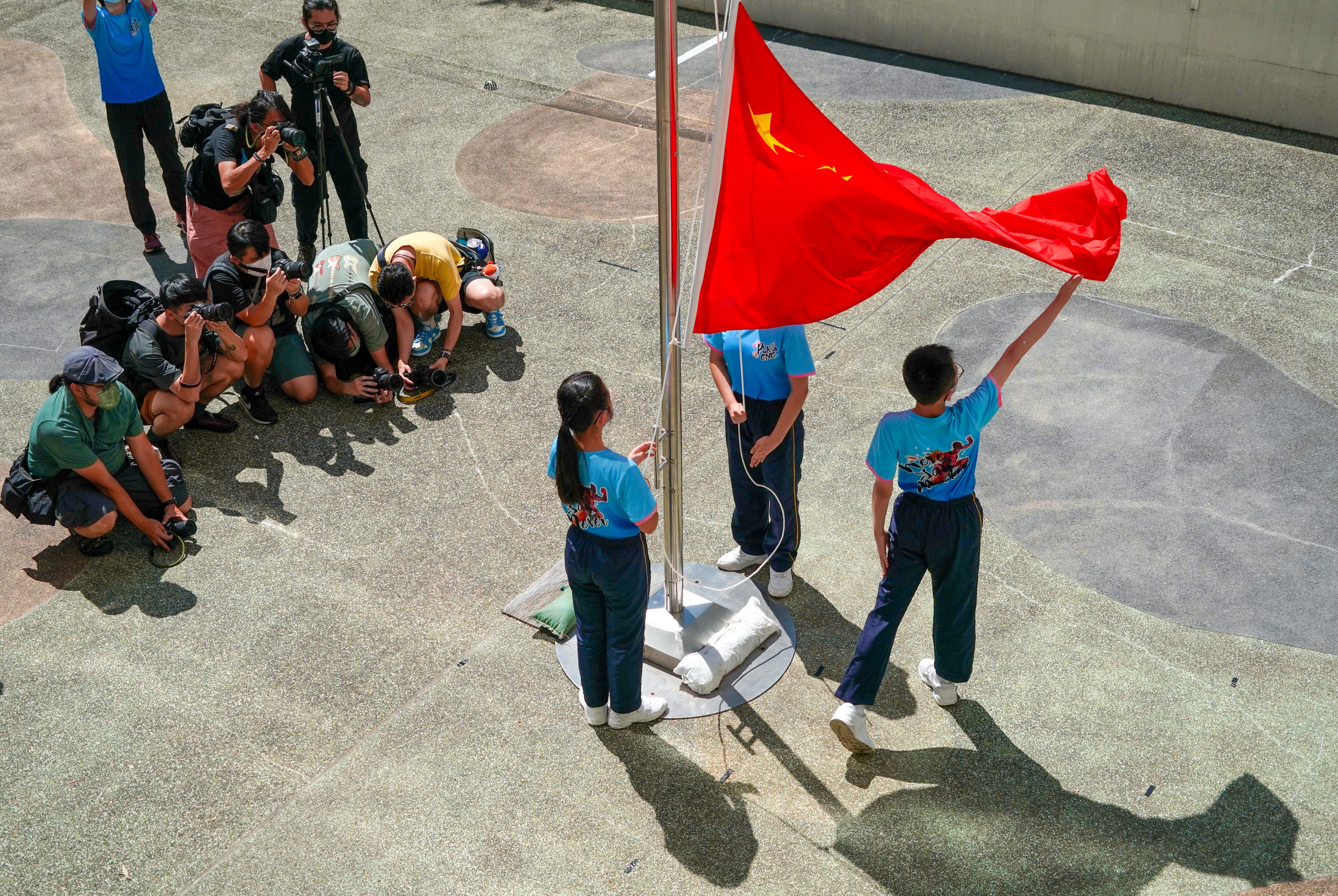 Authorities have advised schools to hold a national flag-raising ceremony on important occasions, including the first day of school. Photo: Felix Wong