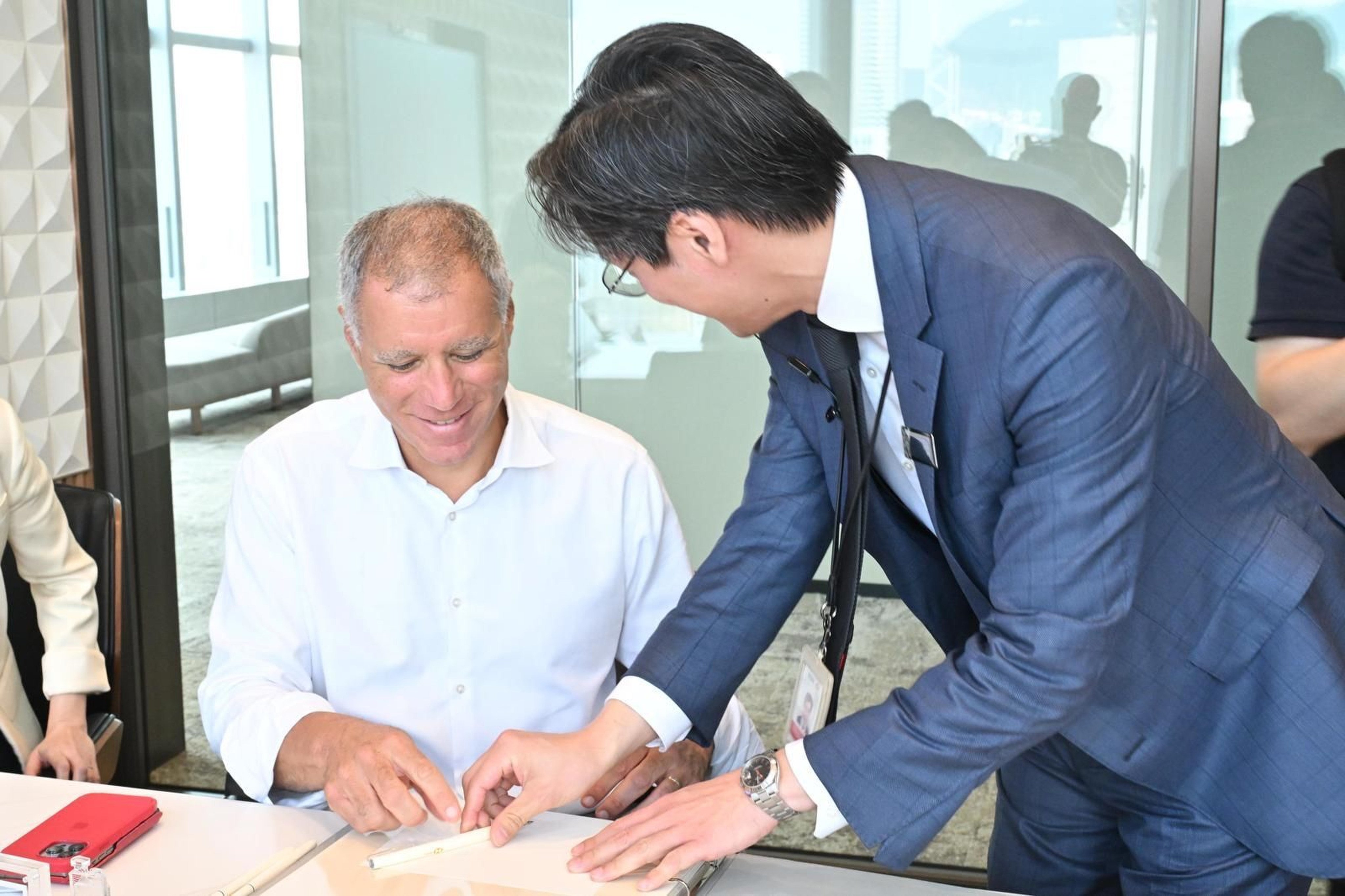 Georges Elhedery (left), HSBC new group CEO, visited the bank’s branches on Des Voeux Road and Hysan Place on Monday. Photo: Handout