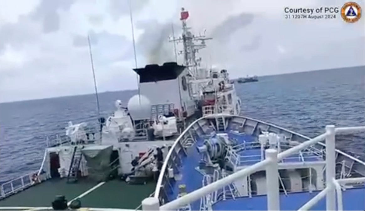 A Chinese Coast Guard ship, right, collides with a Philippine Coast Guard vessel near the Sabina Shoal on Saturday in an image taken from video provided by the Philippine Coast Guard. Photo: Philippine Coast Guard via AP