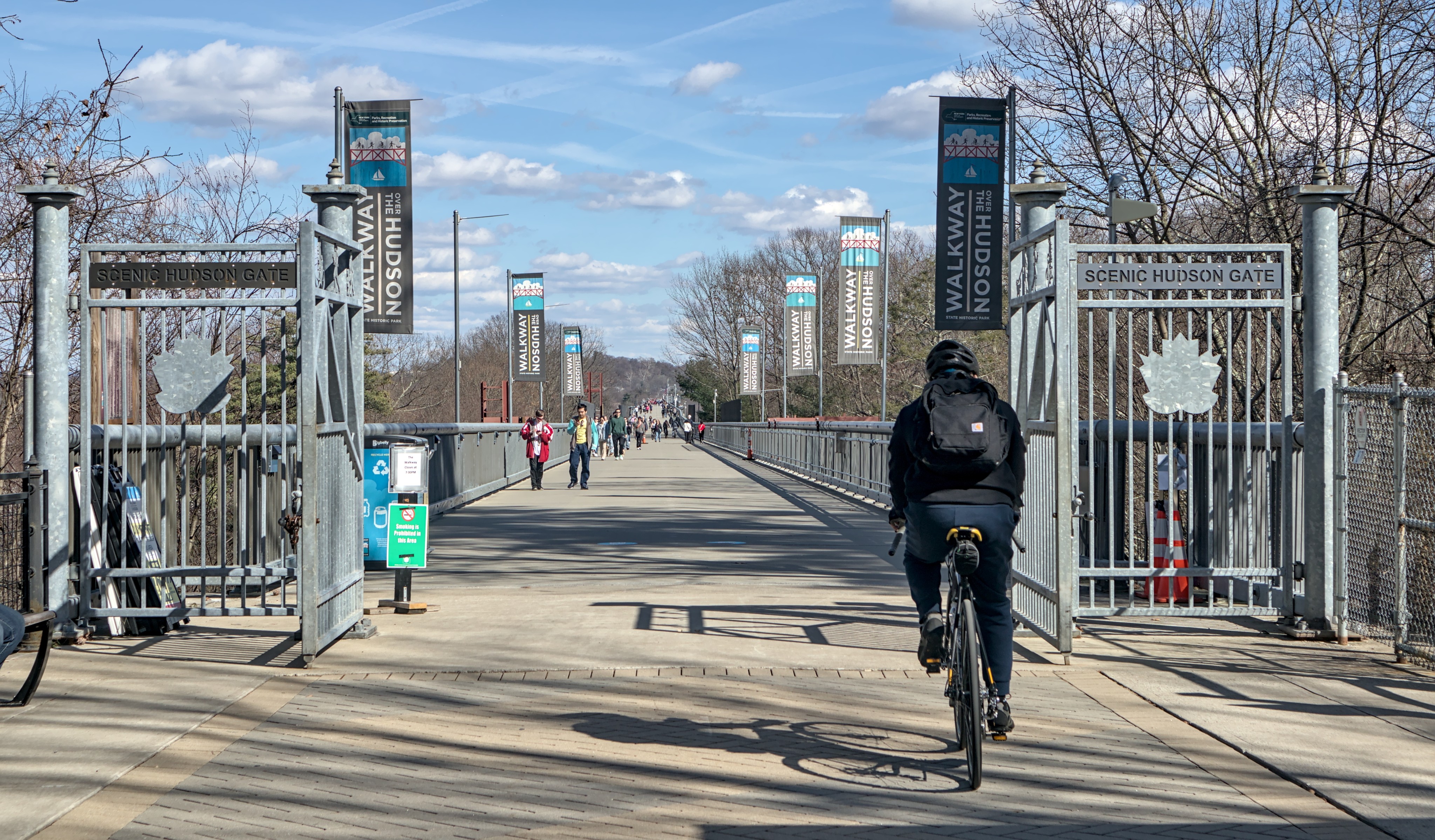 Cyclists and pedestrians take the Walkway Over the Hudson bike path, part of the Empire State Trail, in upstate New York. Photo: Shutterstock