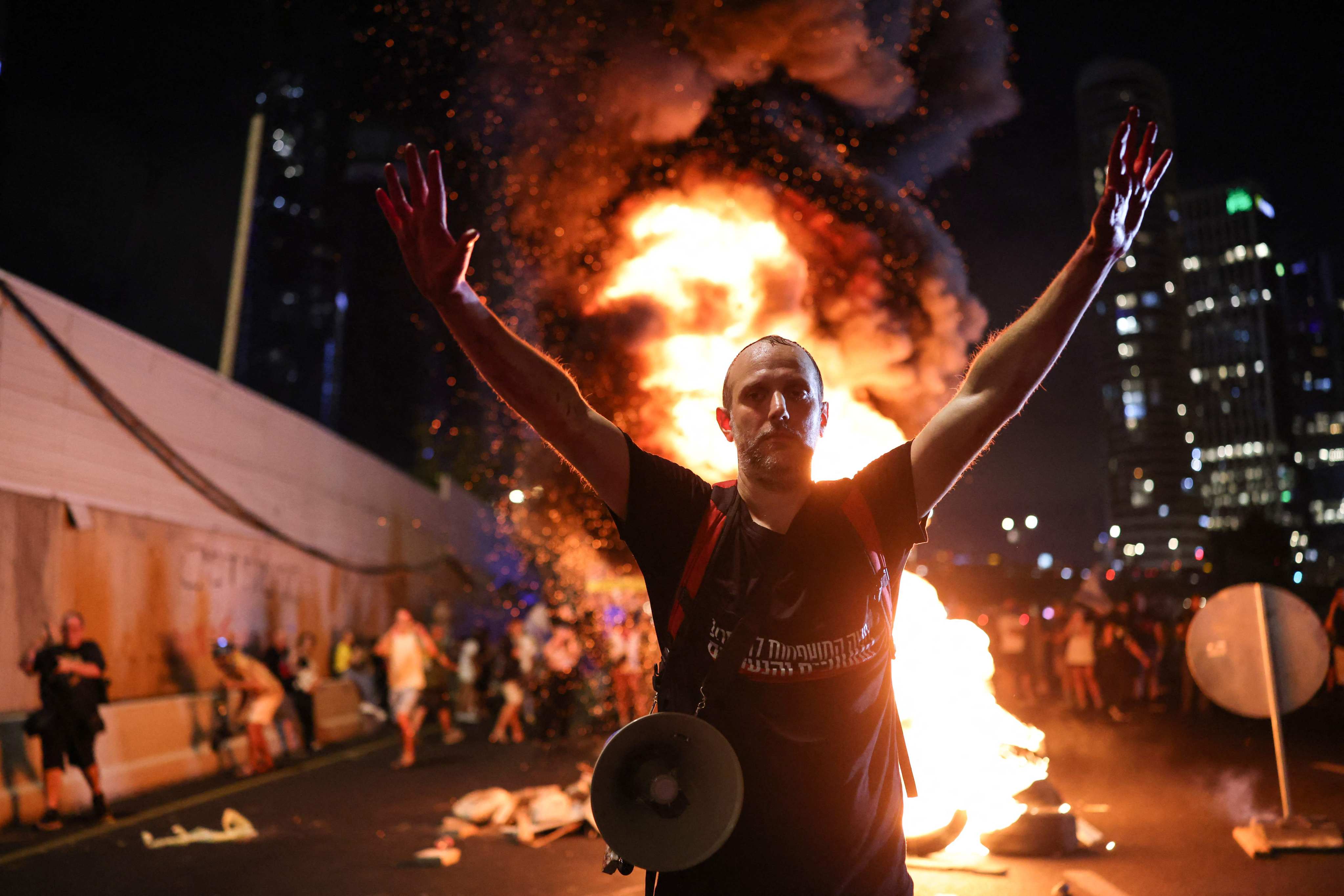 Protesters block Tel Aviv’s Ayalon motorway on Sunday during an anti-government rally calling for the release of Israelis held hostage by Palestinian militants in Gaza. Photo: AFP