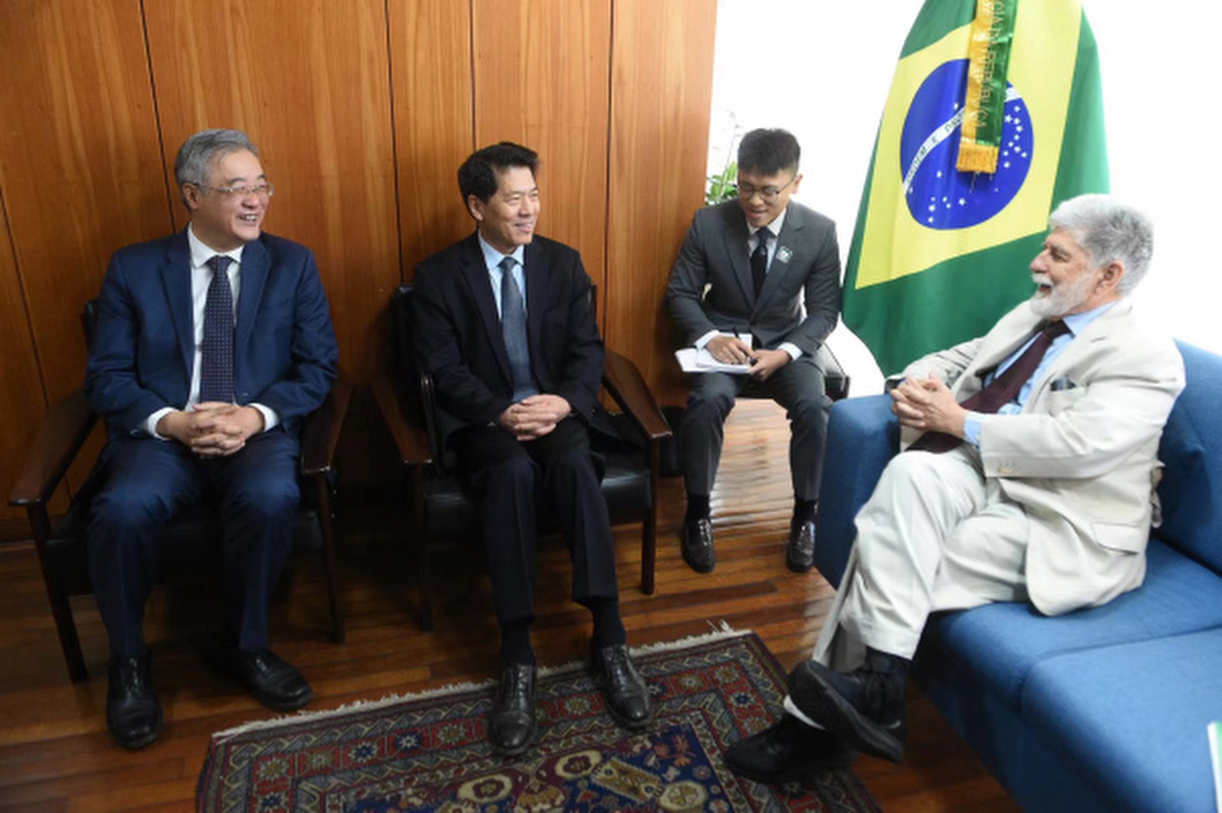 China’s special representative for Eurasian affairs, Li Hui (second left), meets Celso Amorim, special adviser to the president of Brazil, on July 29. Photo: Chinese Foreign Ministry
