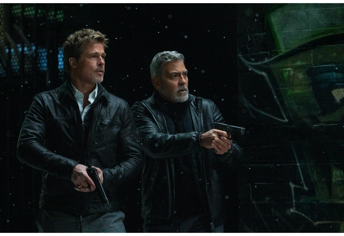 Brad Pitt and George Clooney in a still from Wolfs, which will stream on Apple+. Photo: Sony Pictures.