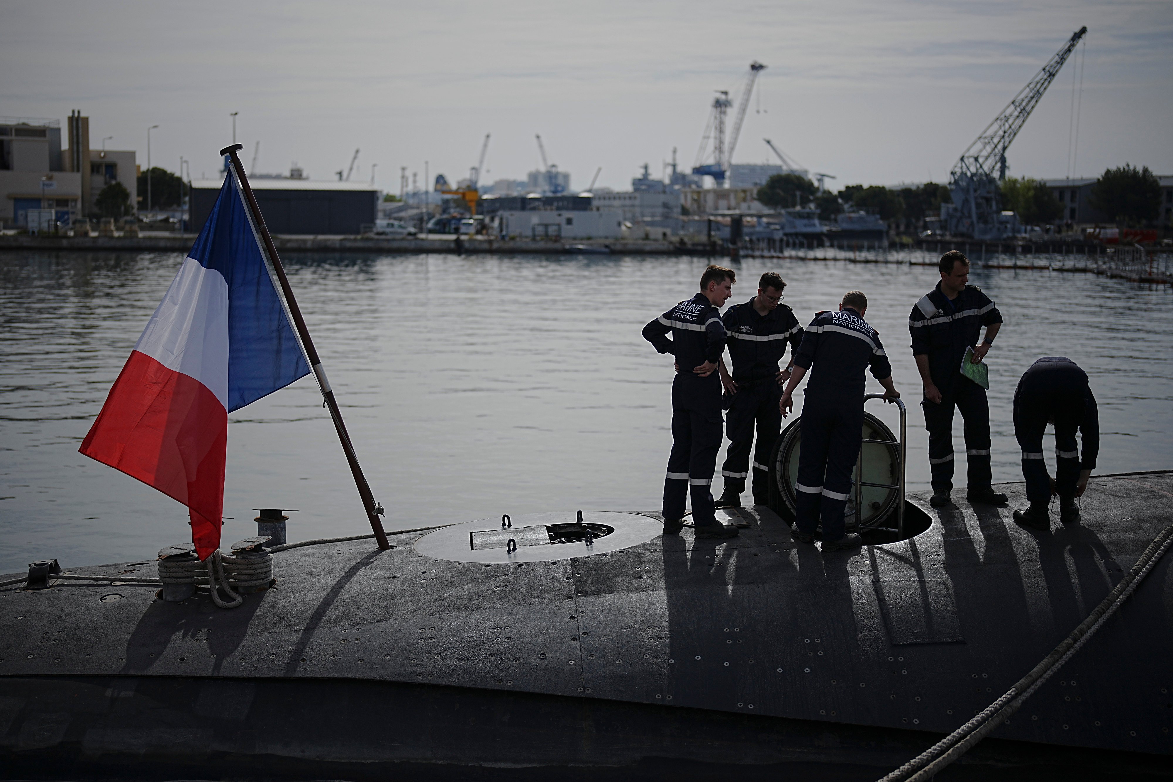 Sailors prepare a French Rubis-class submarine at the Toulon naval base in southern France on April 15,, ahead of Nato training exercises. Photo: AP 
