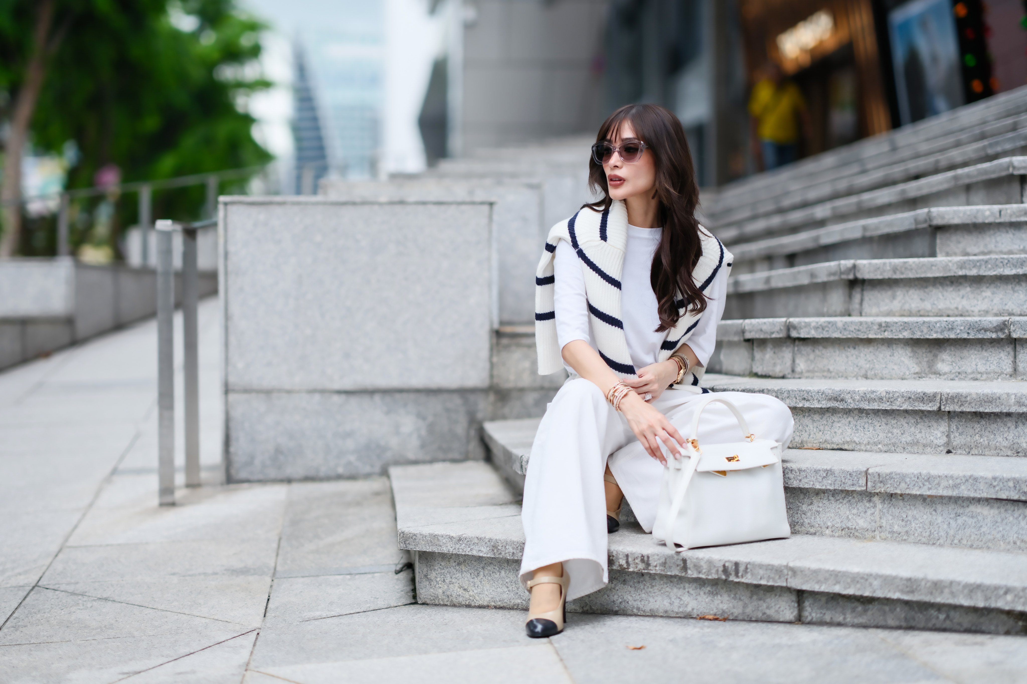 Heart Evangelista wears a dark navy blue and white wool knit pullover in the classic Breton striped style. Photo: Getty Images