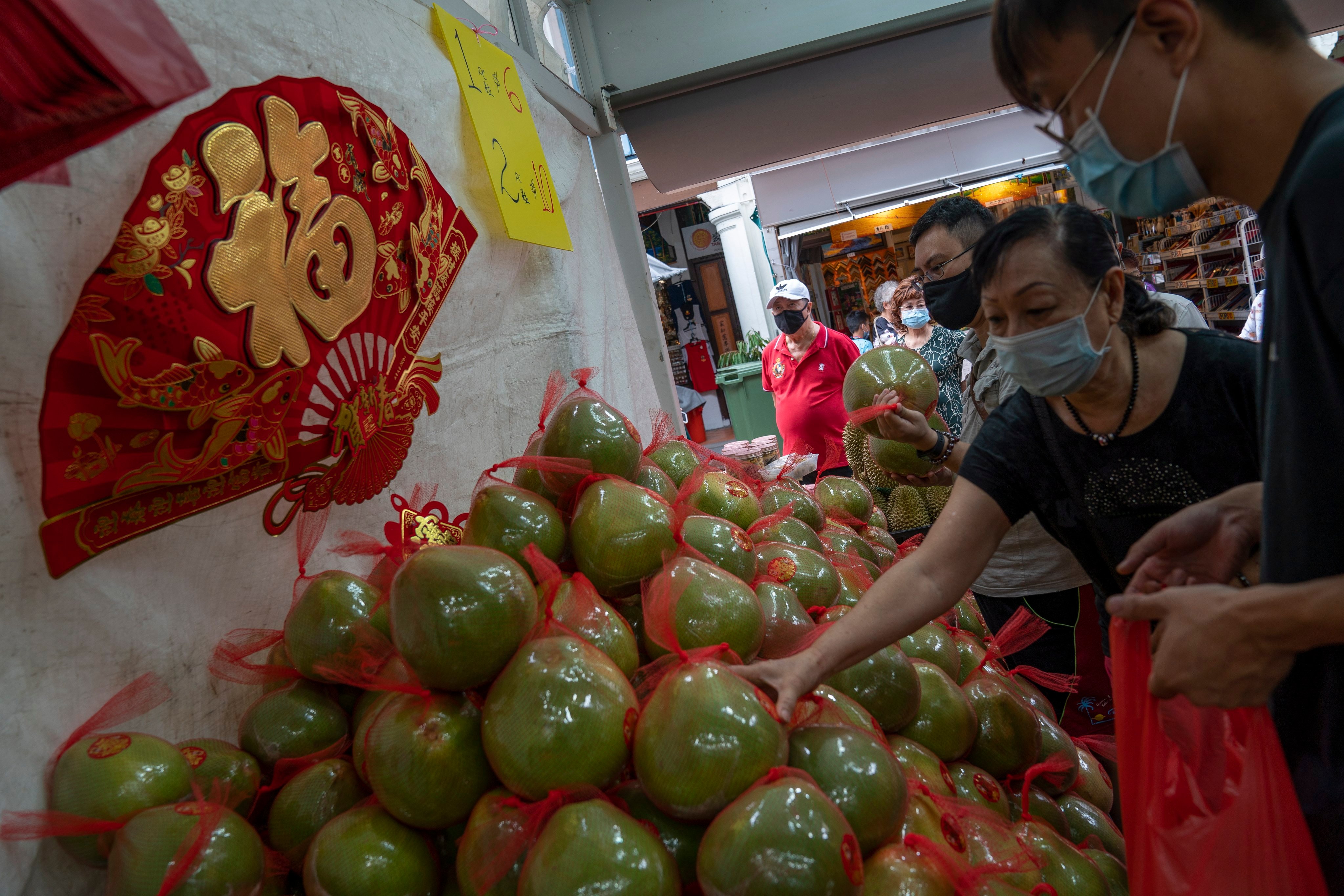 Pomelos are also popular during the Lunar New Year. Photo: EPA-EFE