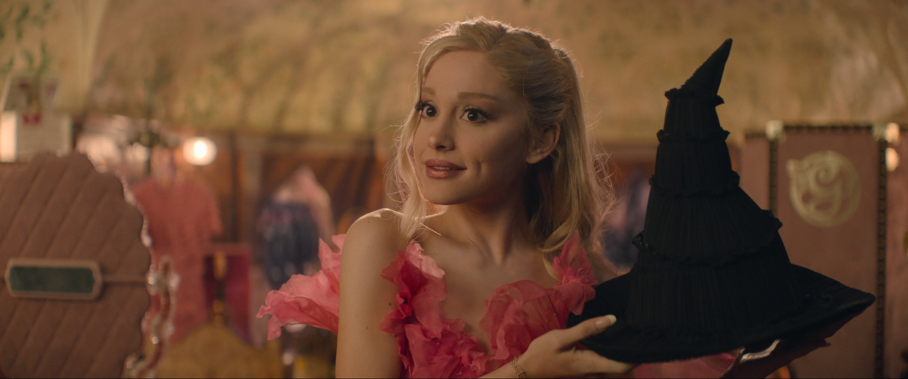 Ariana Grande as Glinda in a still from Wicked.