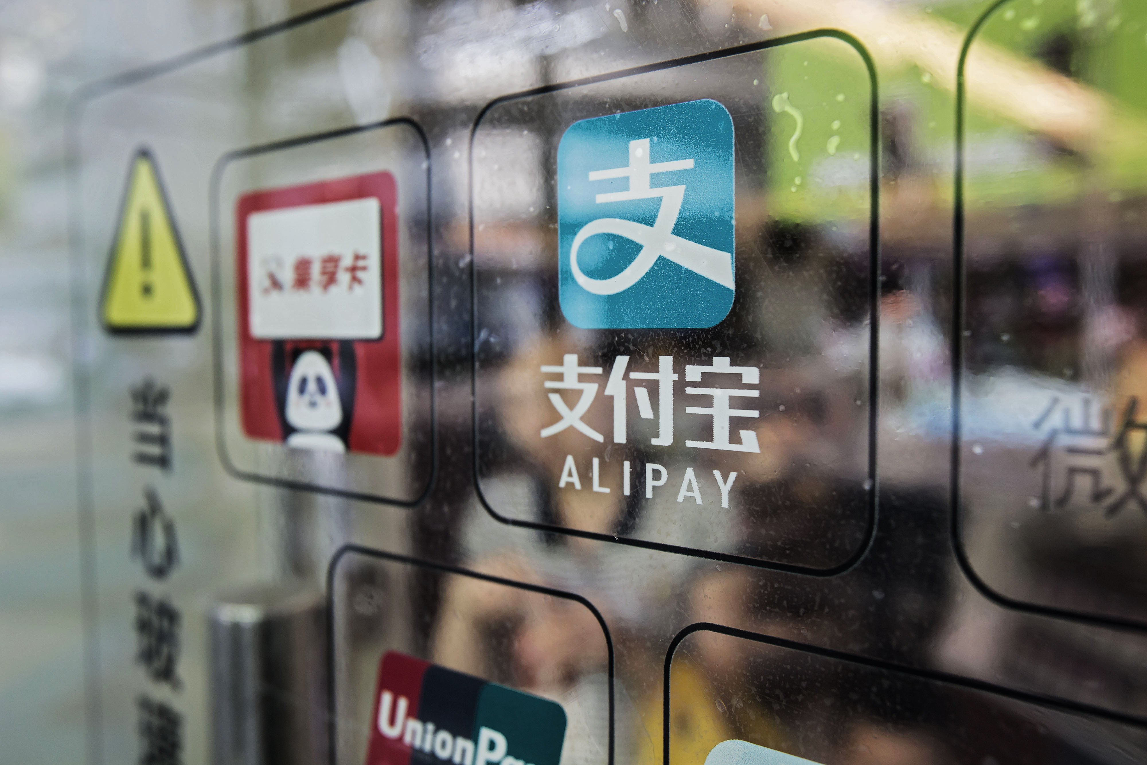 Signage for Ant’s Alipay payment system. Photo: Bloomberg