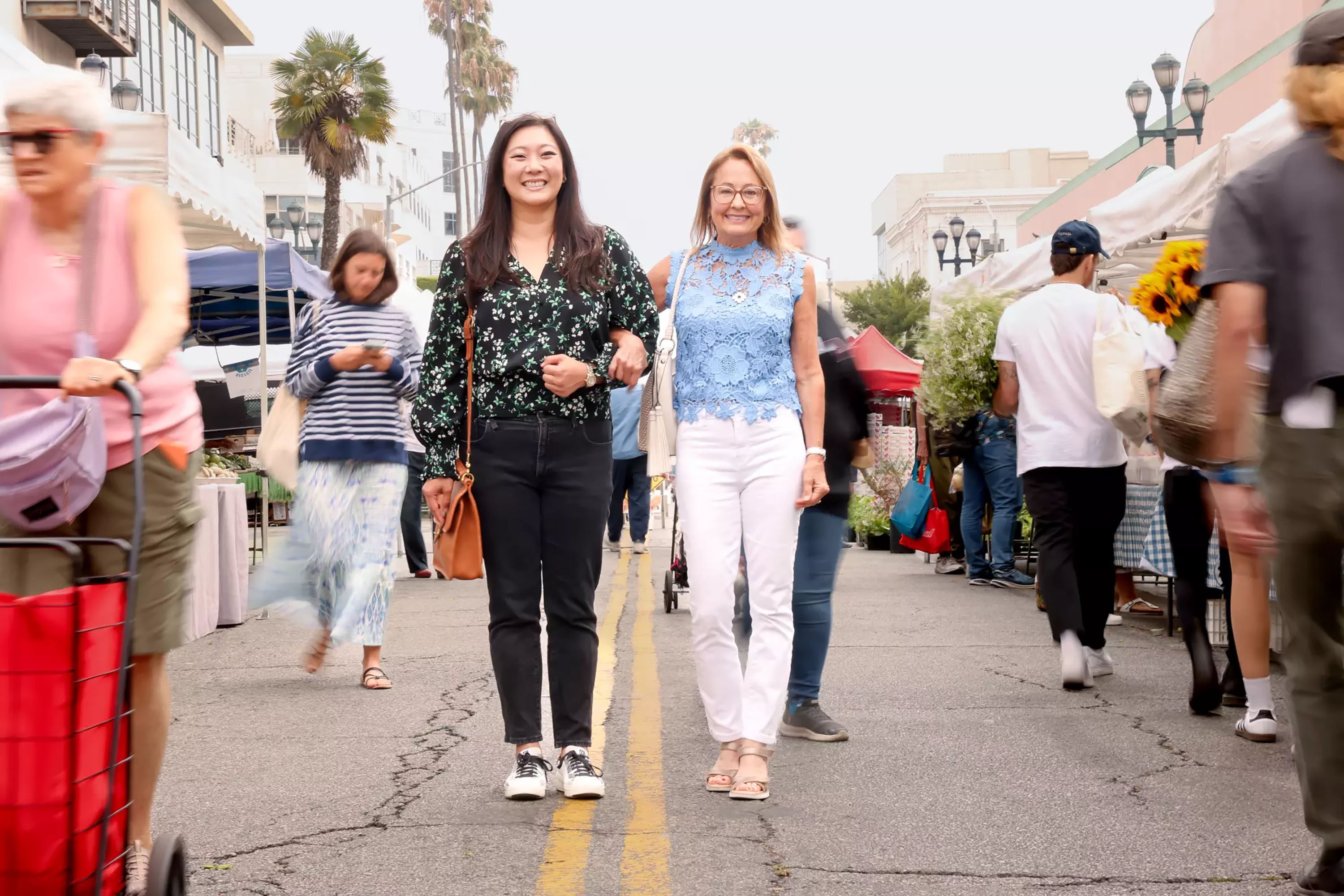 Peggy Cheng (left), 40, and Karen Lektzian, 64, shop at the Santa Monica Farmers Market, in the US state of California. Photo: TNS