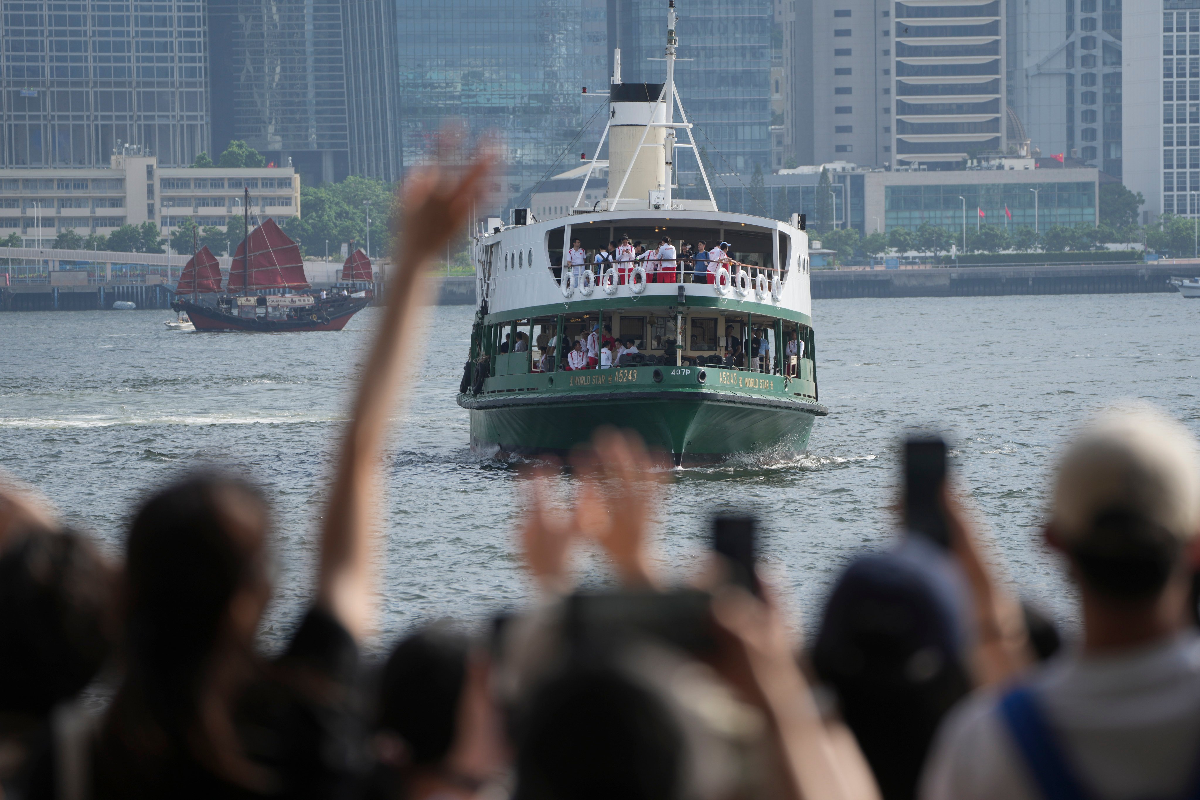 The mainland Chinese Olympic delegation visits Victoria Harbour on August 30. Photo: Sam Tsang