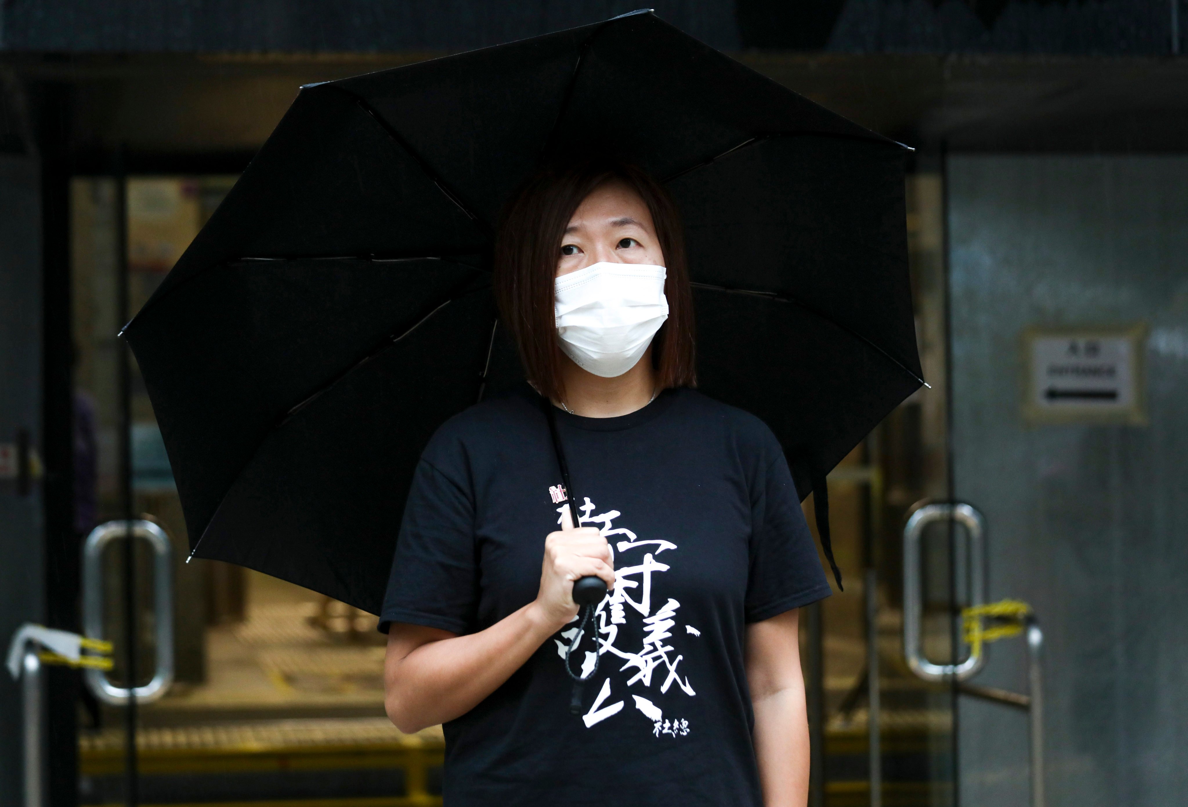 Social worker Jackie Chen appears at a court in Wan Chai to stand trial on rioting charges. Photo: Xiaomei Chen