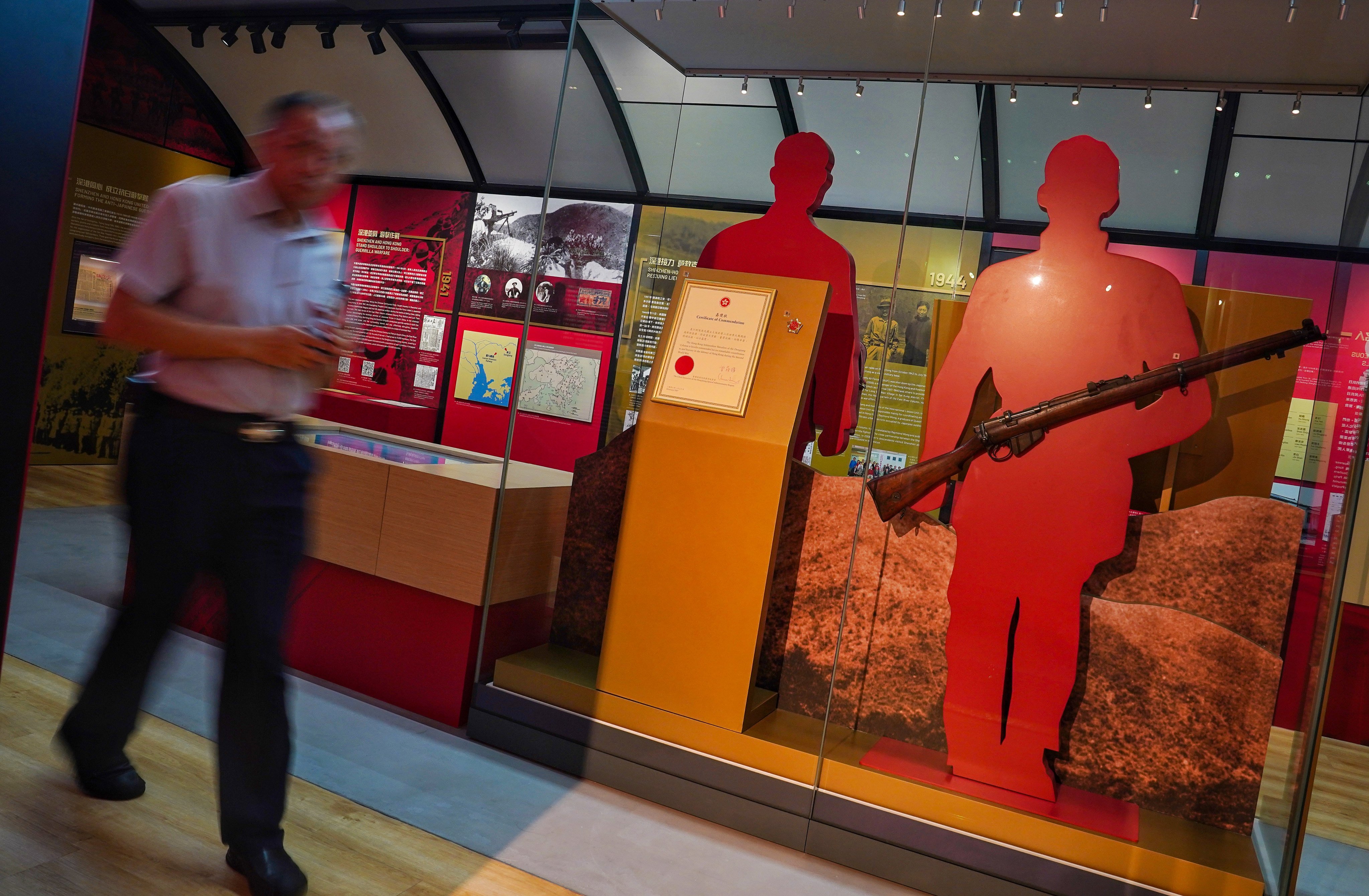 The activities of the East River Column in Shenzhen and Hong Kong are depicted in an exhibit. Photo: Elson Li