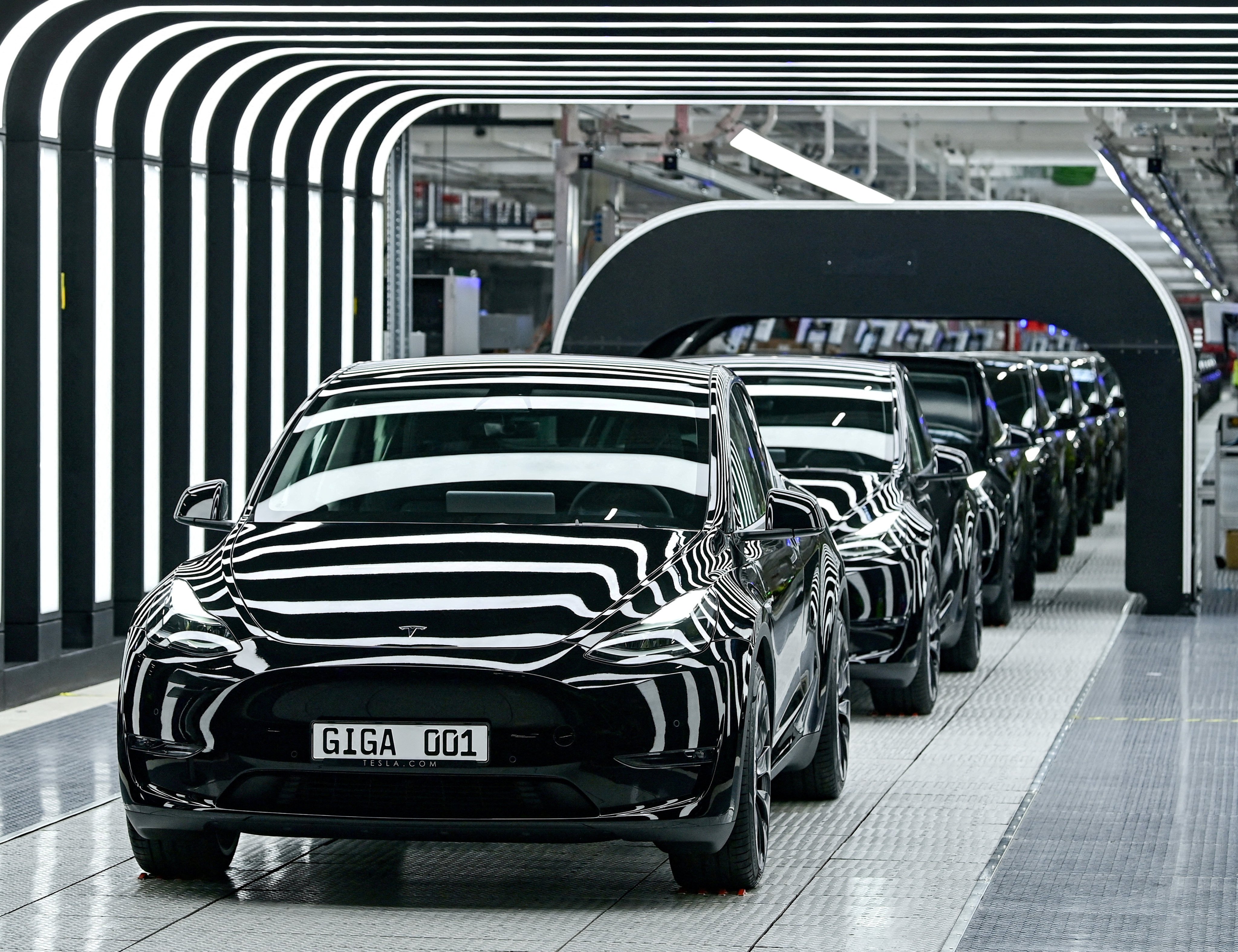 Model Y cars are pictured during the opening ceremony of the new Tesla Gigafactory for electric cars in Gruenheide, Germany in March 2022. Photo: Reuters