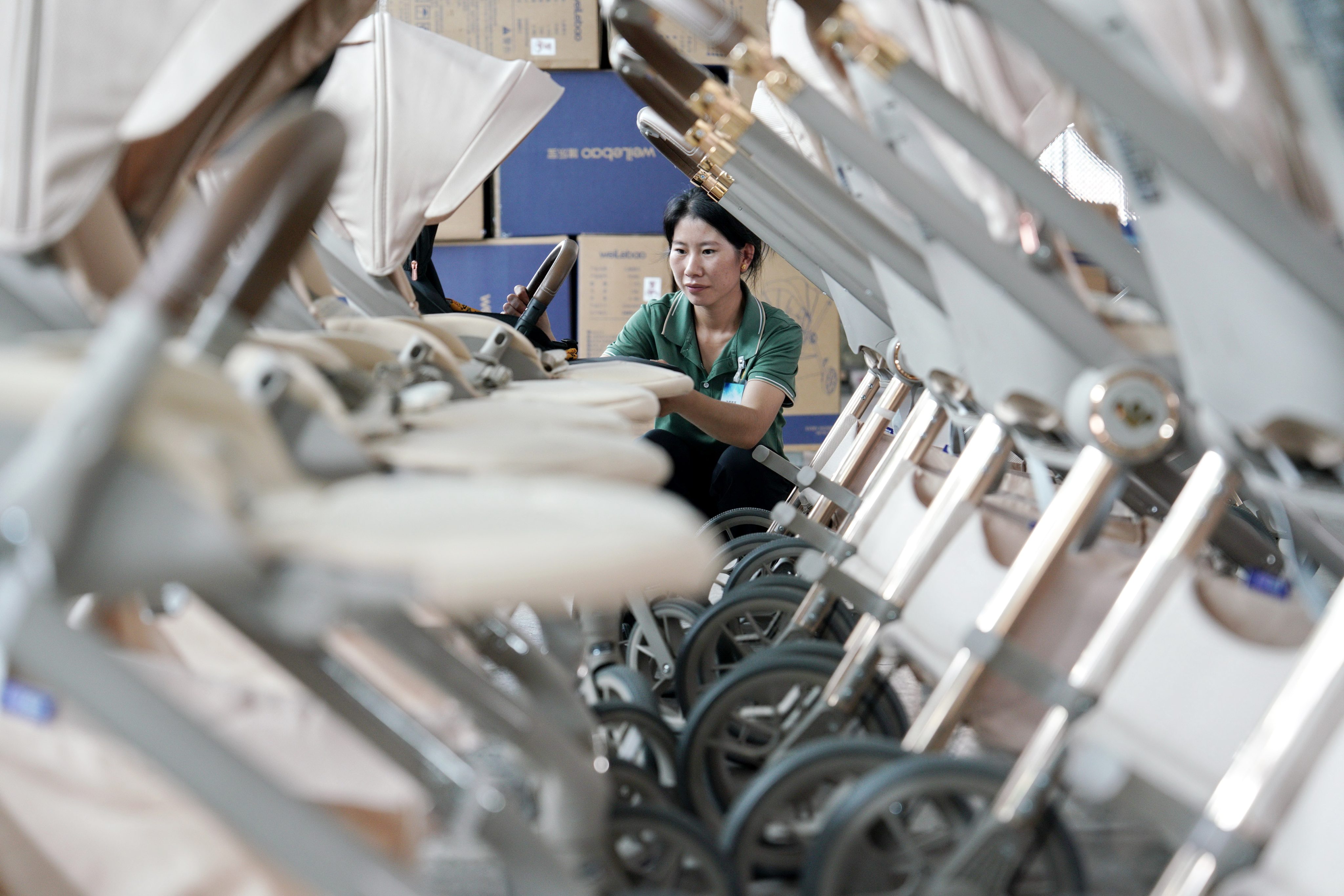  A worker is seen at a children wheels factory in Pingxiang County in northern China’s Hebei province. Photo: Xinhua