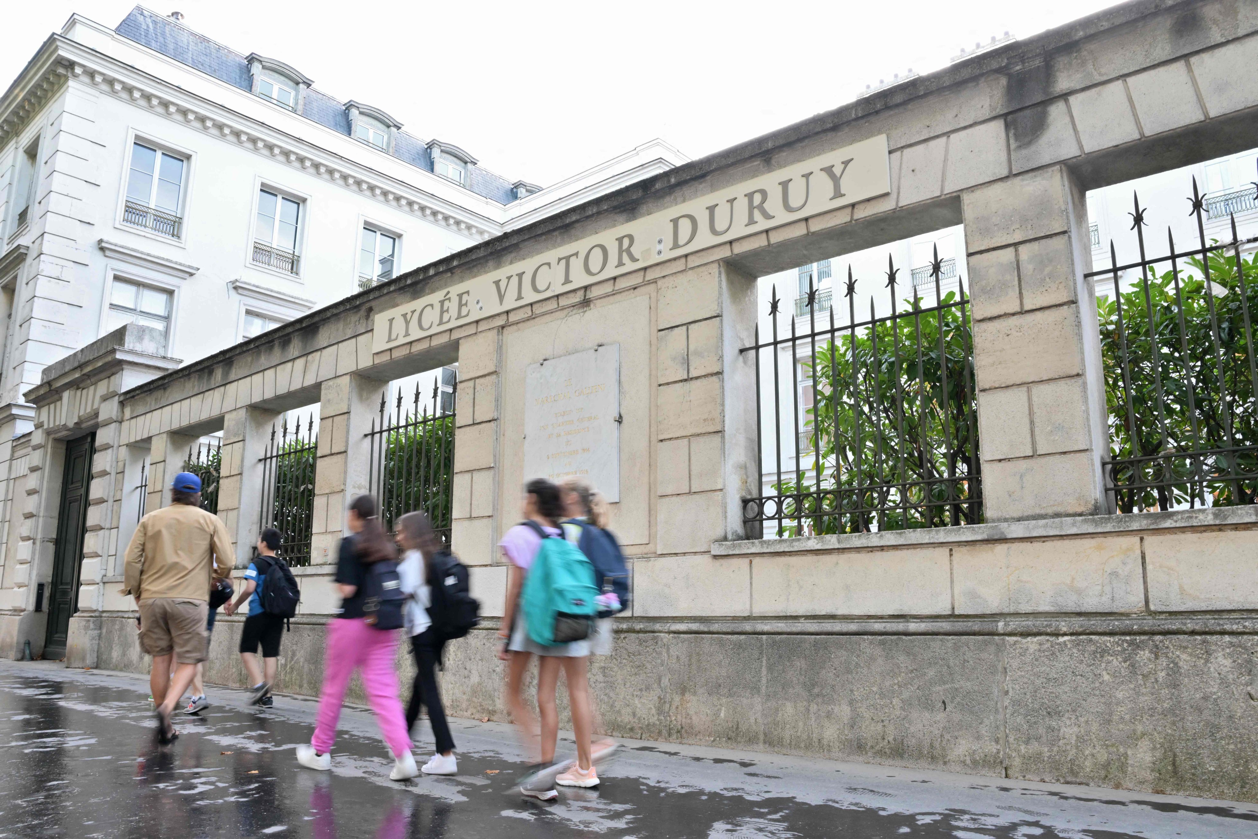 Pupils arrive at Victor-Duruy high school in Paris. In high schools, which French children attend between the ages of 15 and 18, internal regulations may prohibit the use of a mobile phone by pupils in “all or part of the premises”. Photo: AFP