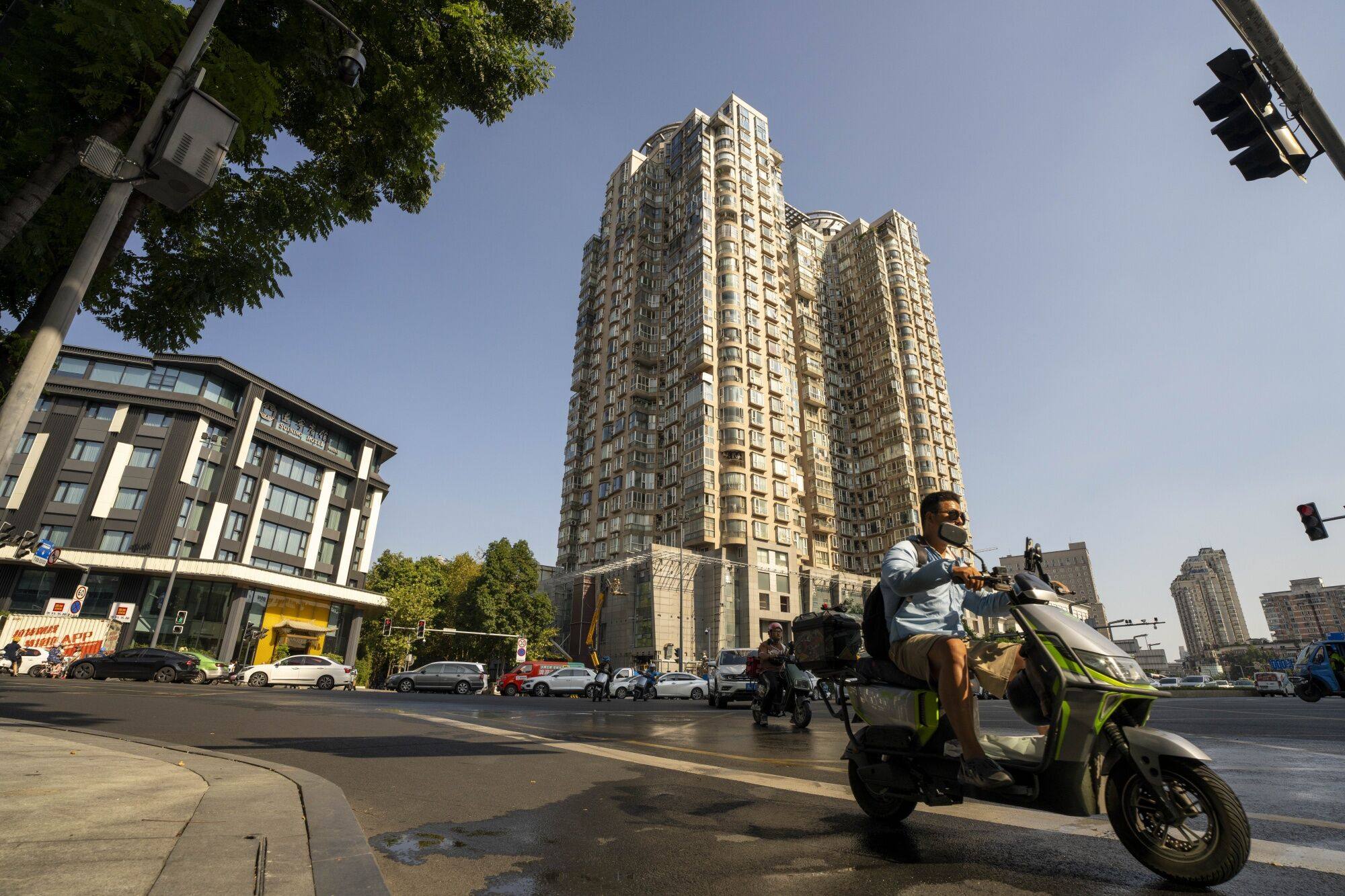 China’s localities should limit their reliance on land and tax incentives to bring in new investment, a state media commentary said. Photo: Bloomberg