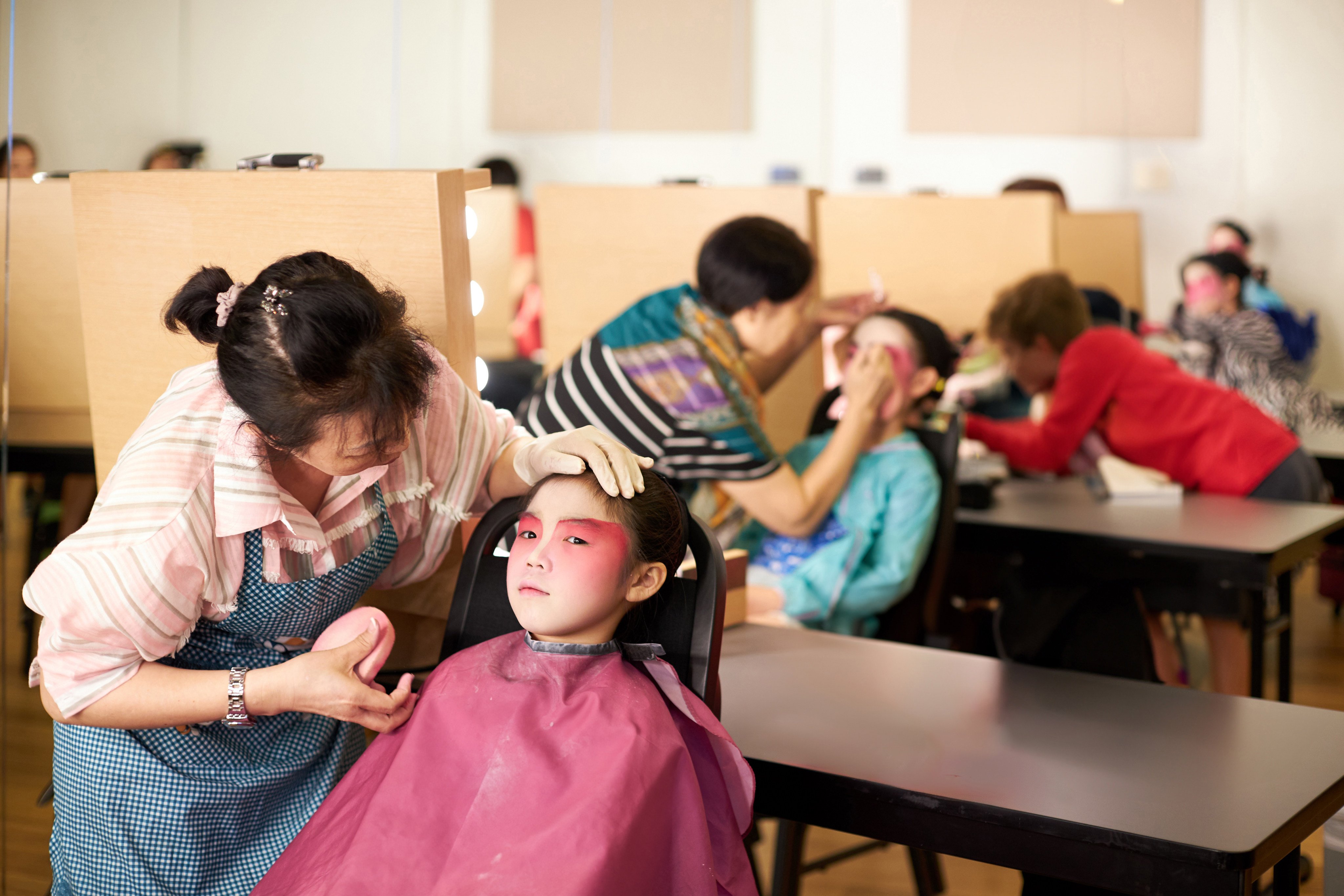 Families take part in a workshop at the WestK Fun Fest. If Hong Kong is prepared to use infrastructure bonds to fund major developmental projects like bridges, roads and entire islands, it should also come to the aid of West Kowloon Cultural District. Photo: West Kowloon Cultural District Authority
