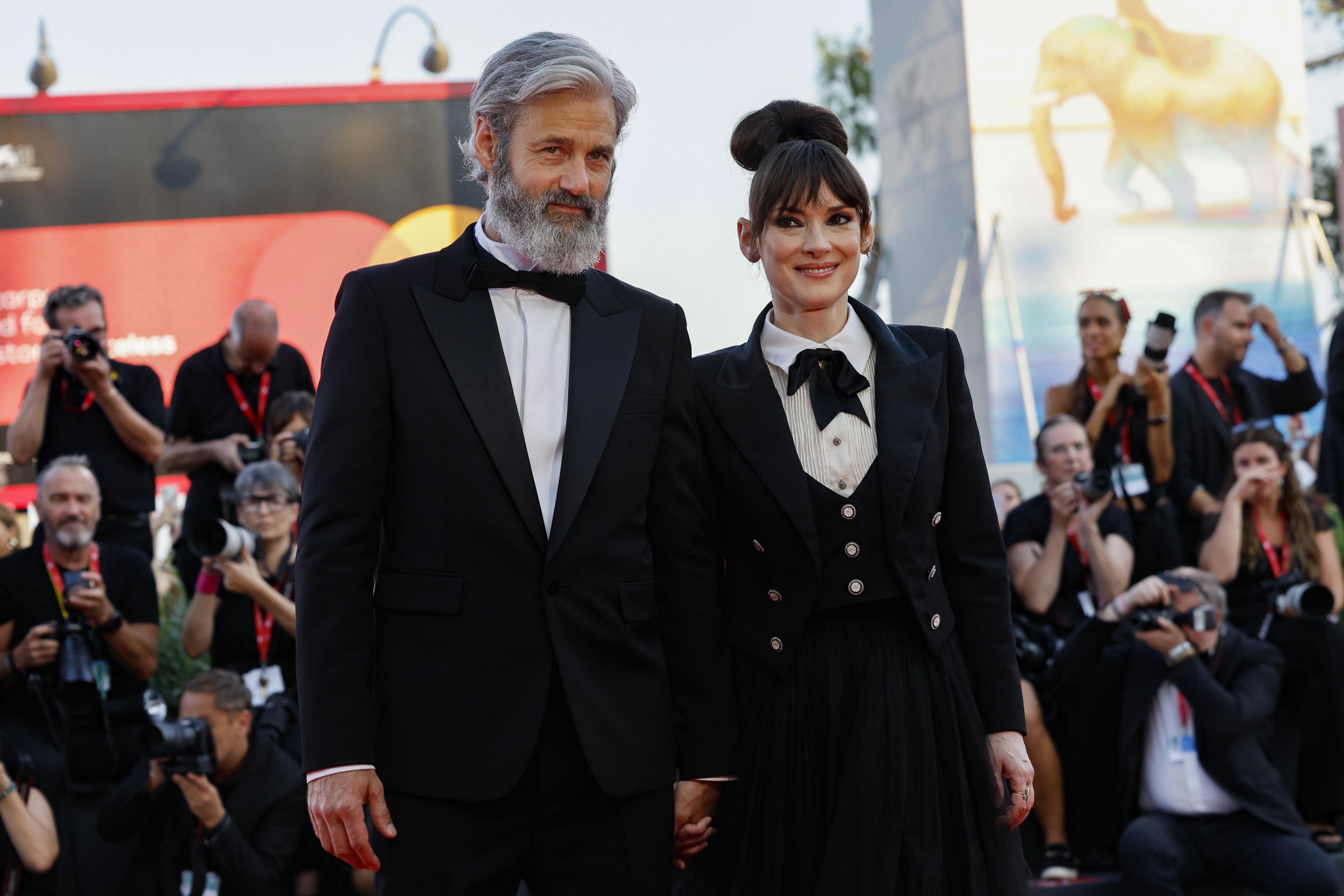 US actor Winona Ryder and Scott Mackinlay Hahn arrive for the opening ceremony and screening of Beetlejuice Beetlejuice at the 81st annual Venice International Film Festival, in Venice, Italy, in August. Photo: EPA-EFE