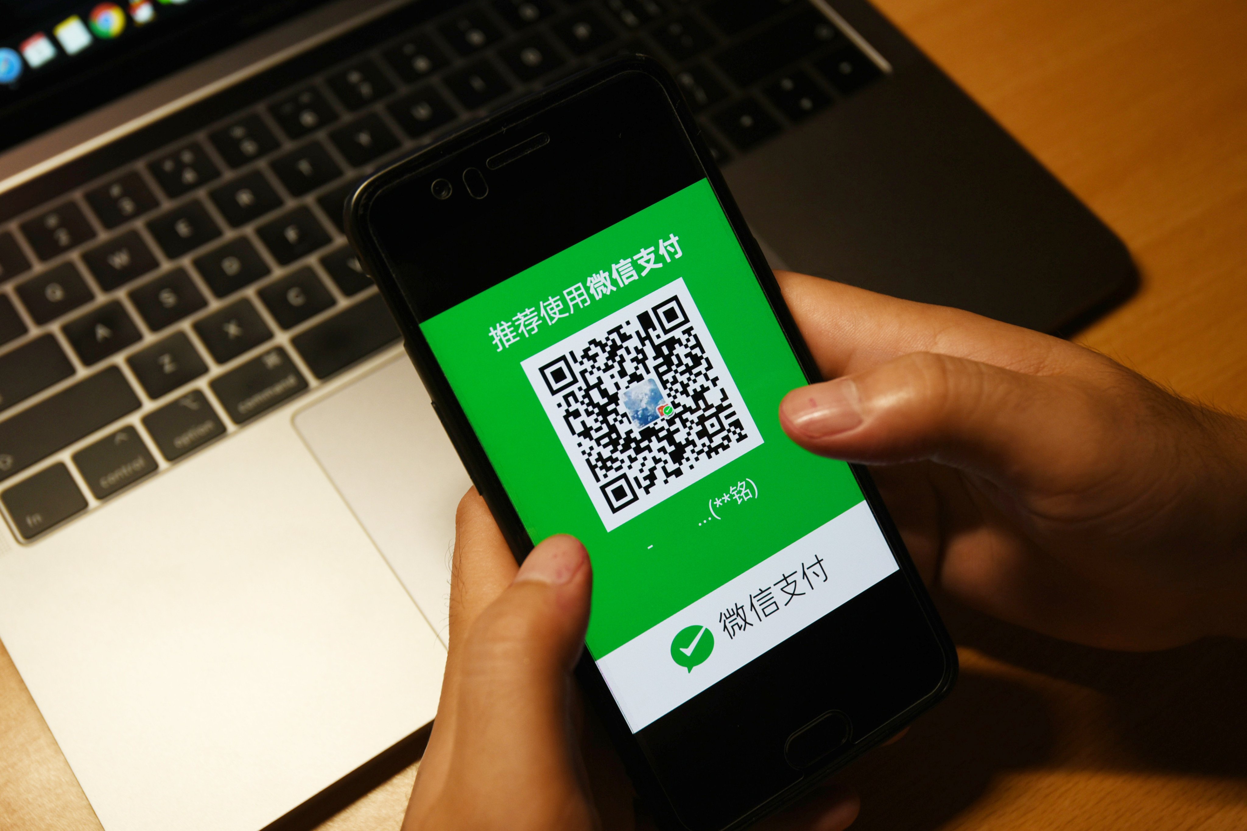 Alibaba’s Taobao and Tmall will start making WeChat Pay available for merchants next week. Photo: Shutterstock