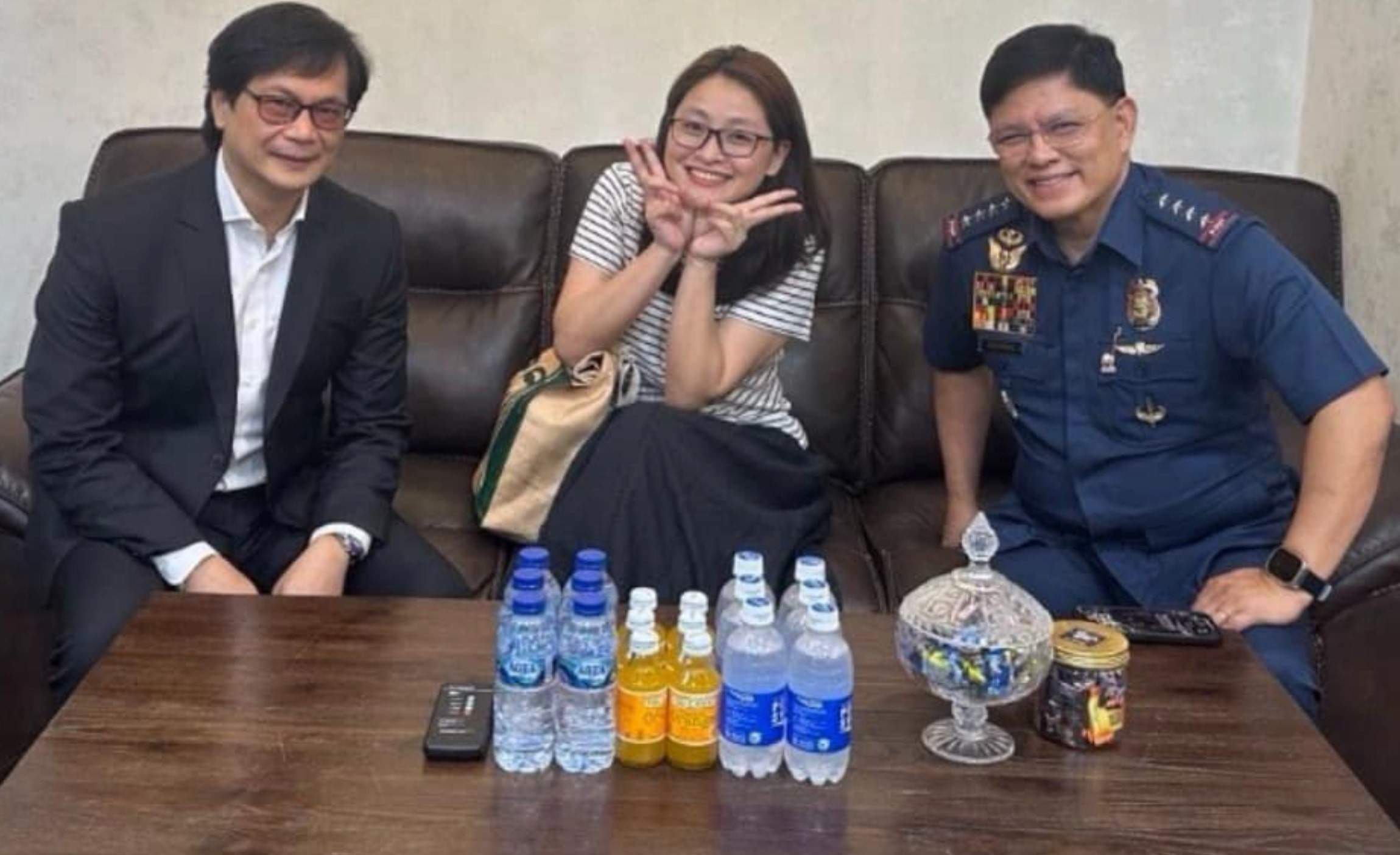 Fugitive ex-mayor Alice Guo sits smiling between Department of Interior and Local Governments Secretary Benhur Abalos and Philippine National Police Director General Rommel Marbil in Jakarta on September 5. Photo: Facebook / Benhur Abalos