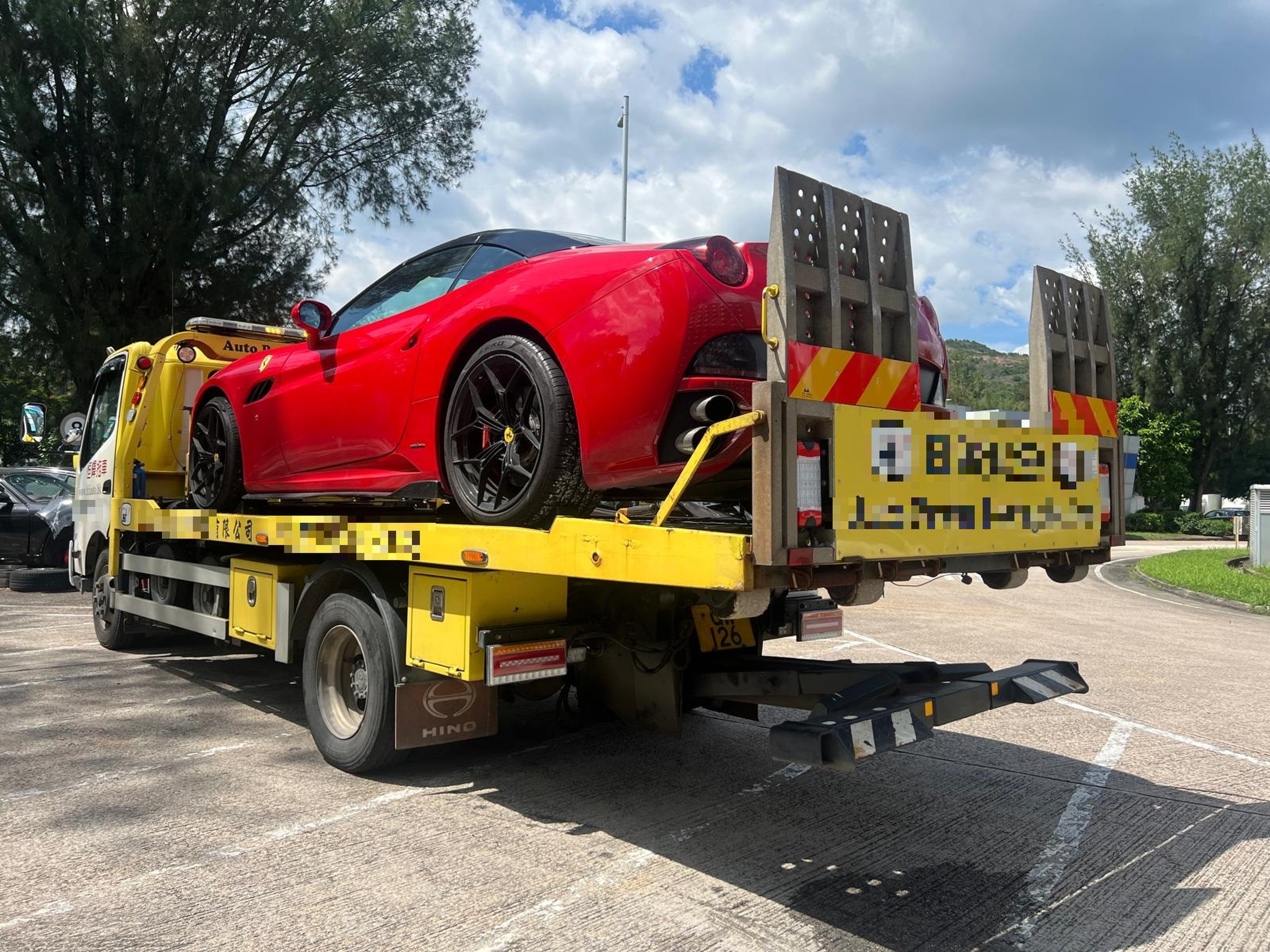 The red Ferrari is impounded by police after the driver’s arrest on Thursday afternoon. Photo: SCMP