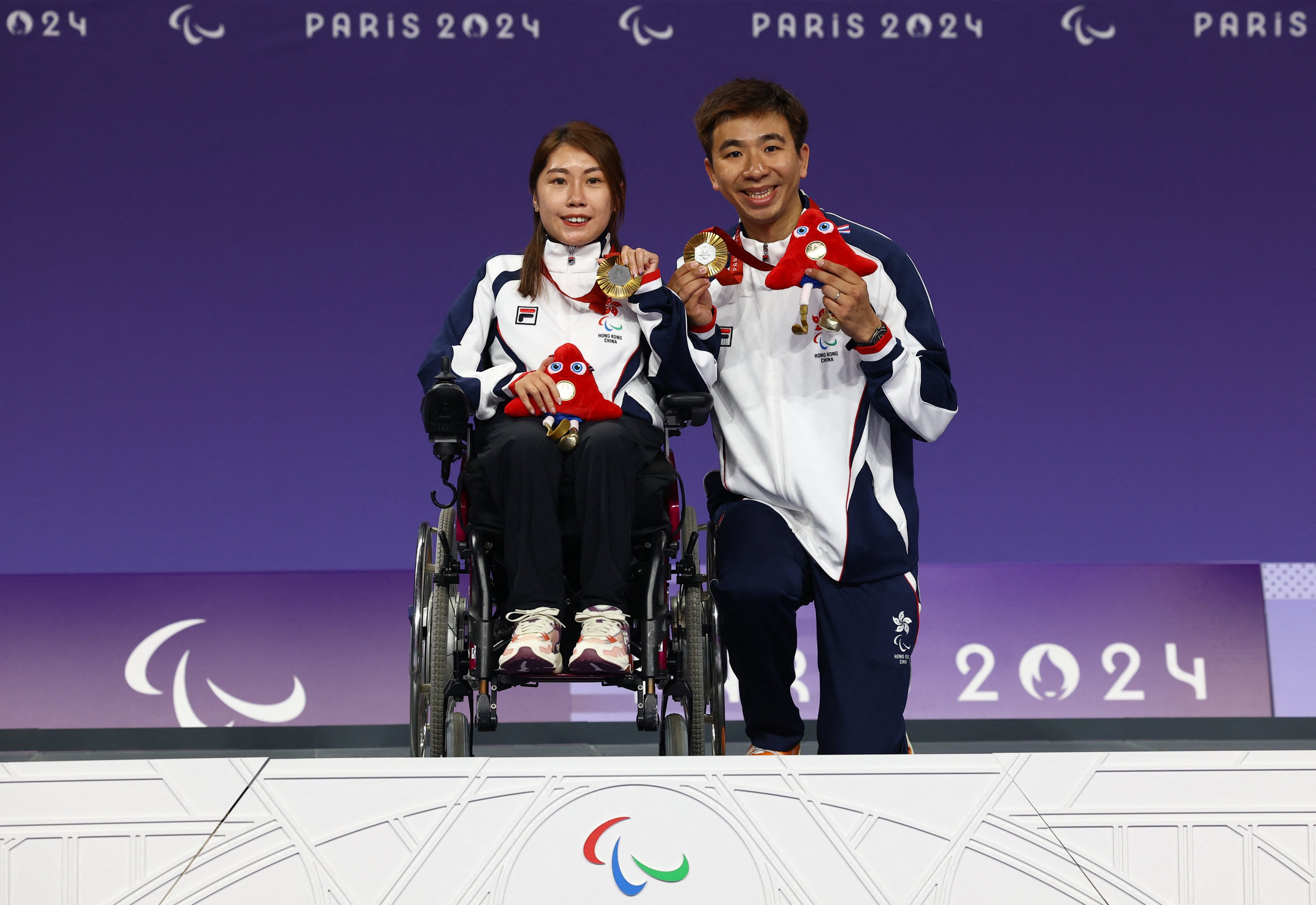 Ho Yuen-kei (left) has now won two gold medals at the Paris Paralympics with victory the Boccia individual and mixed pairs BC3 event at the Paralympic Games.