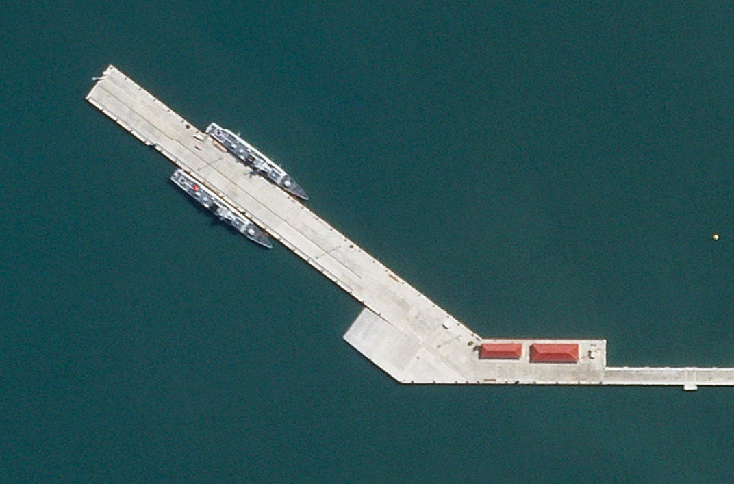 Satellite images show two Chinese ship docked at Cambodia’s Ream naval base, in May. Photo: Planet Labs PBC via AP