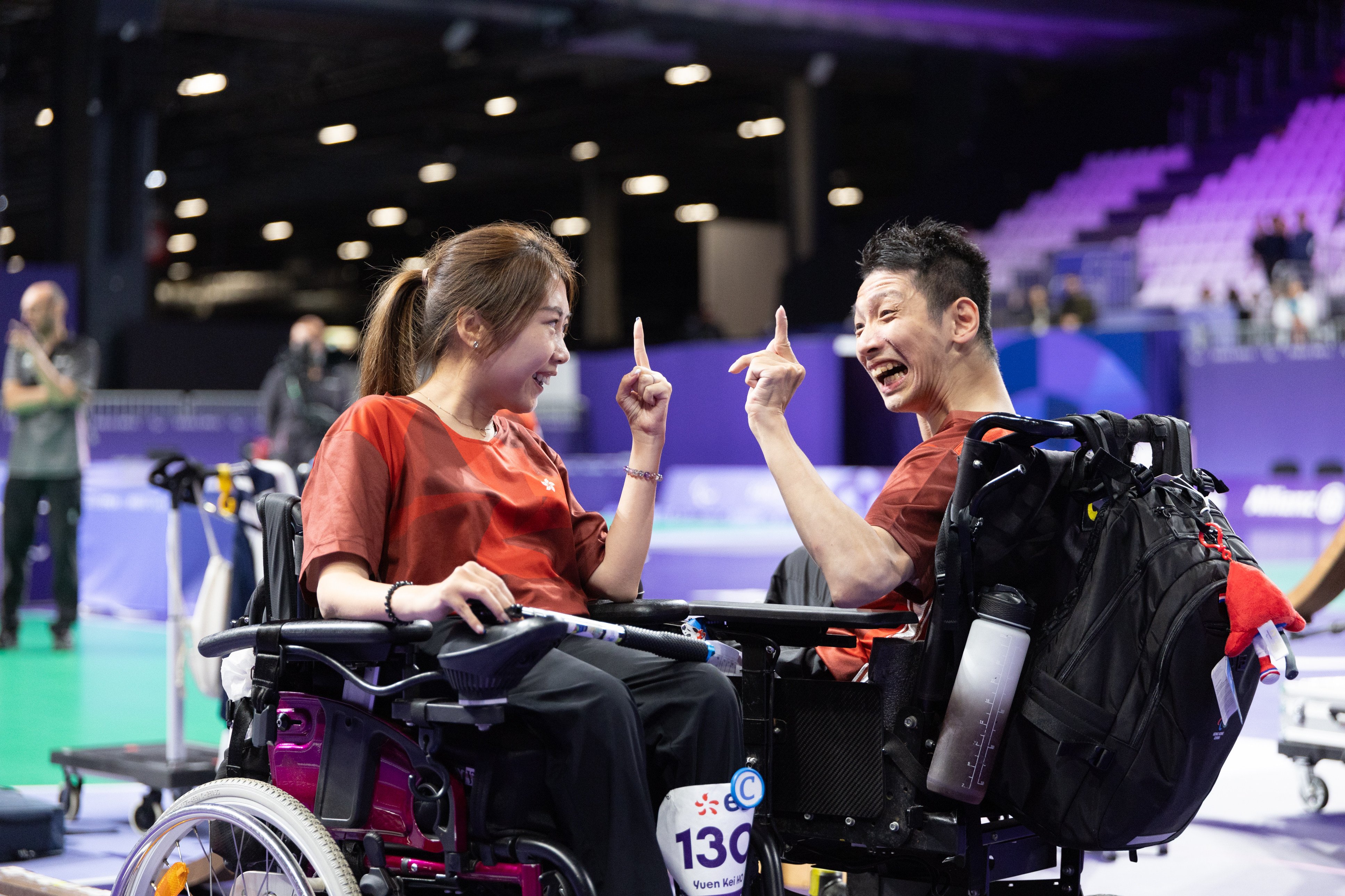 Boccia gold medallists Ho Yuen-kei (left) and Tse Tak-wah celebrate winning the BC3 mixed pairs at the Paris Paralympics. Photo: China Hong Kong Paralympic Committee