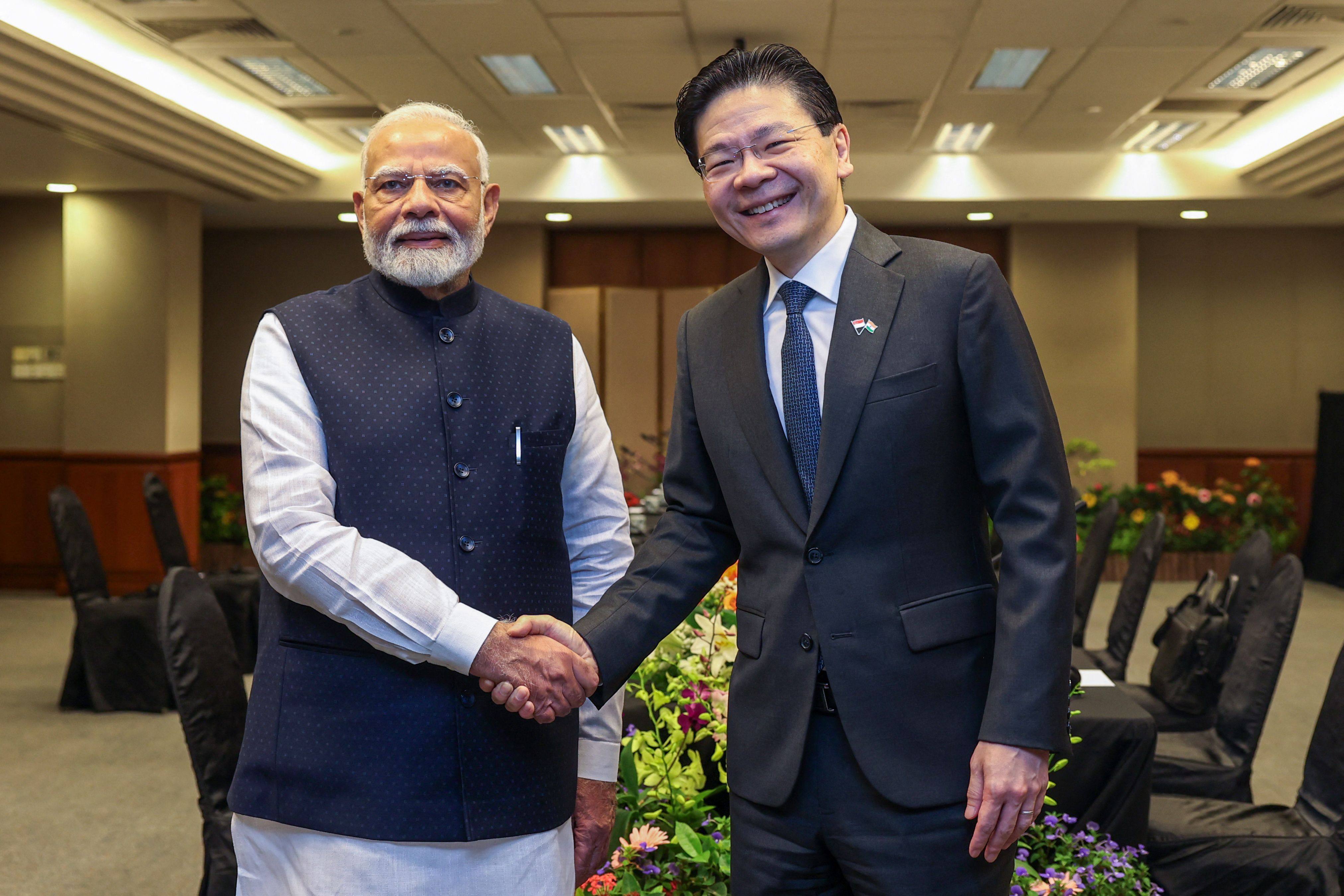 Singapore’s Prime Minister Lawrence Wong (right) shaking hands with India’s Prime Minister Narendra Modi. Photo: Singapore’s Ministry of Digital Development and Information/AFP