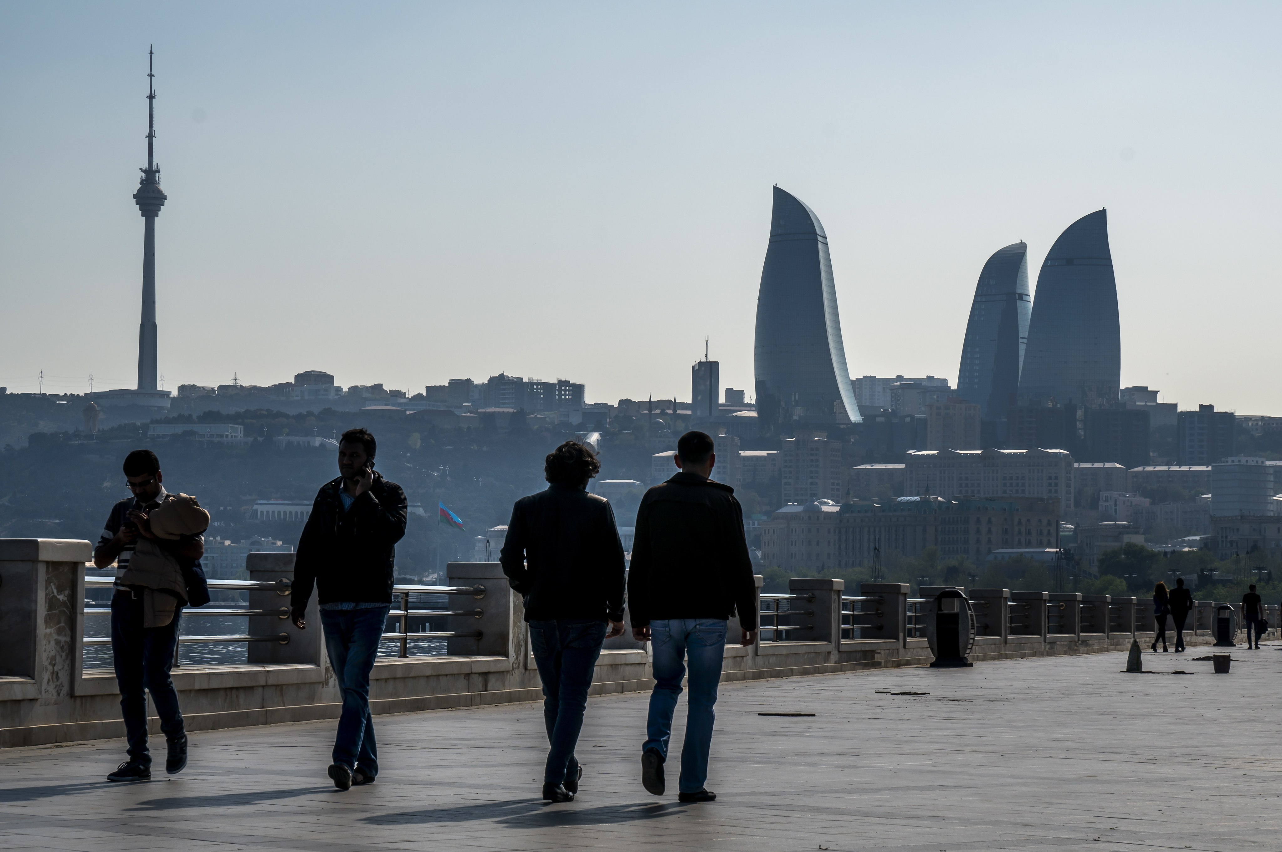 People walk along a Caspian seaside promenade, with the Flame Towers in the distance, in Baku, Azerbaijan, in April 2019. As Azerbaijan moves to join Brics, it must strike a cautious balance between its multipolar ambitions and existing connections with the West. Photo: EPA-EFE
