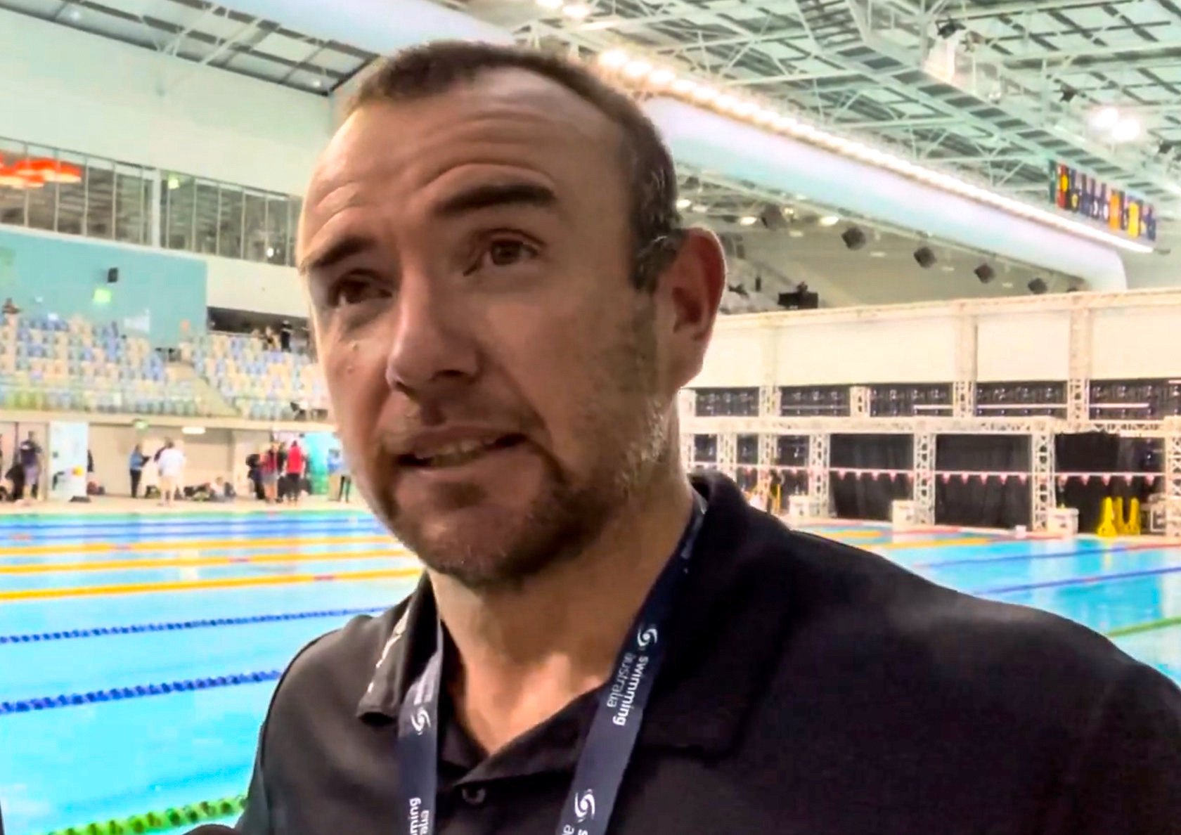 Michael Palfrey was sacked for urging one of his former charges, South Korea’s Kim Woo-min, to victory when there were two swimmers in the Australian team in contention. Photo: Youtube