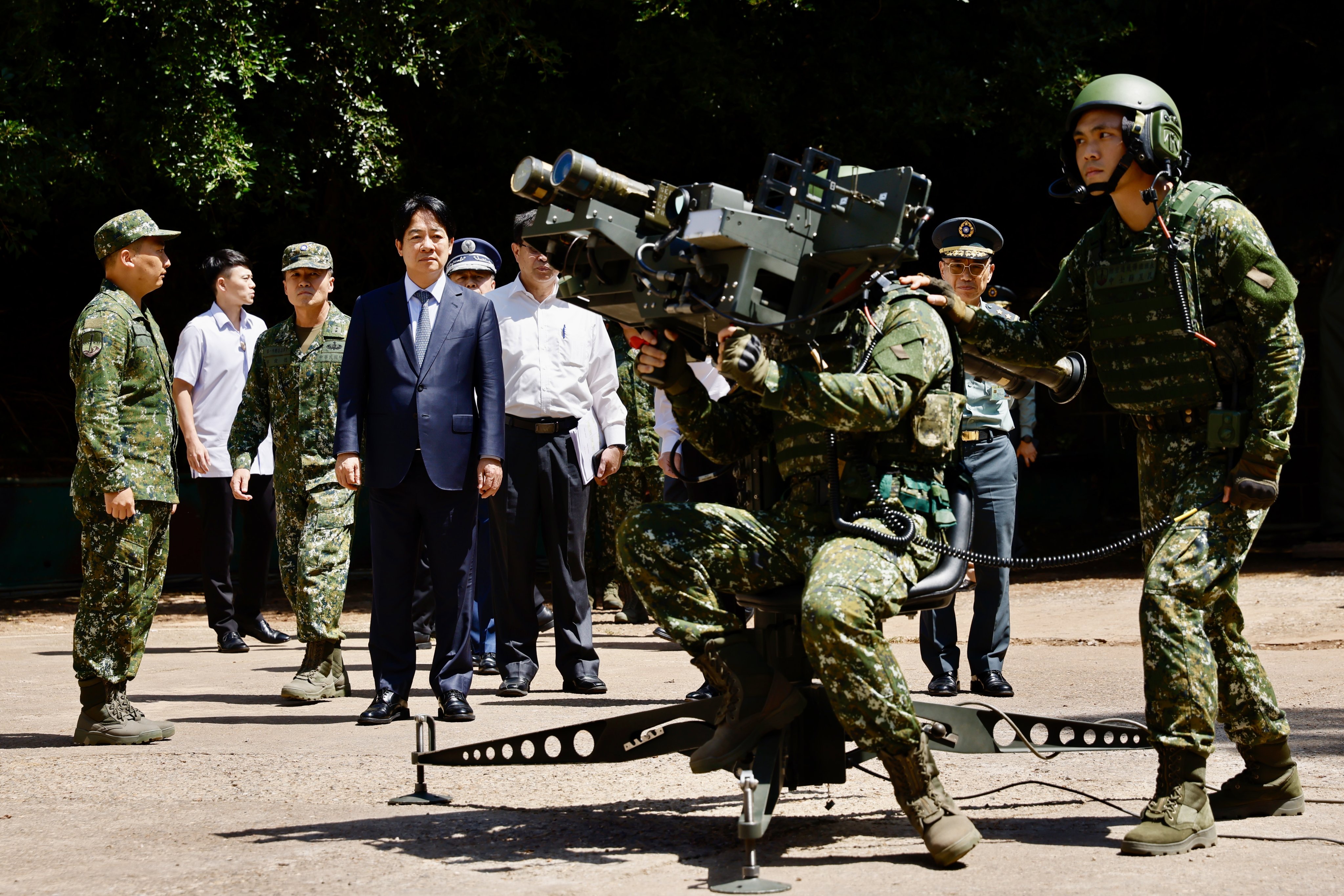 Taiwanese leader William Lai, who has proposed a 6 per cent increase in the defence budget, watches a missile launcher demonstration  at an army base in Taiwan’s Penghu county on Friday. Photo: EPA-EFE 