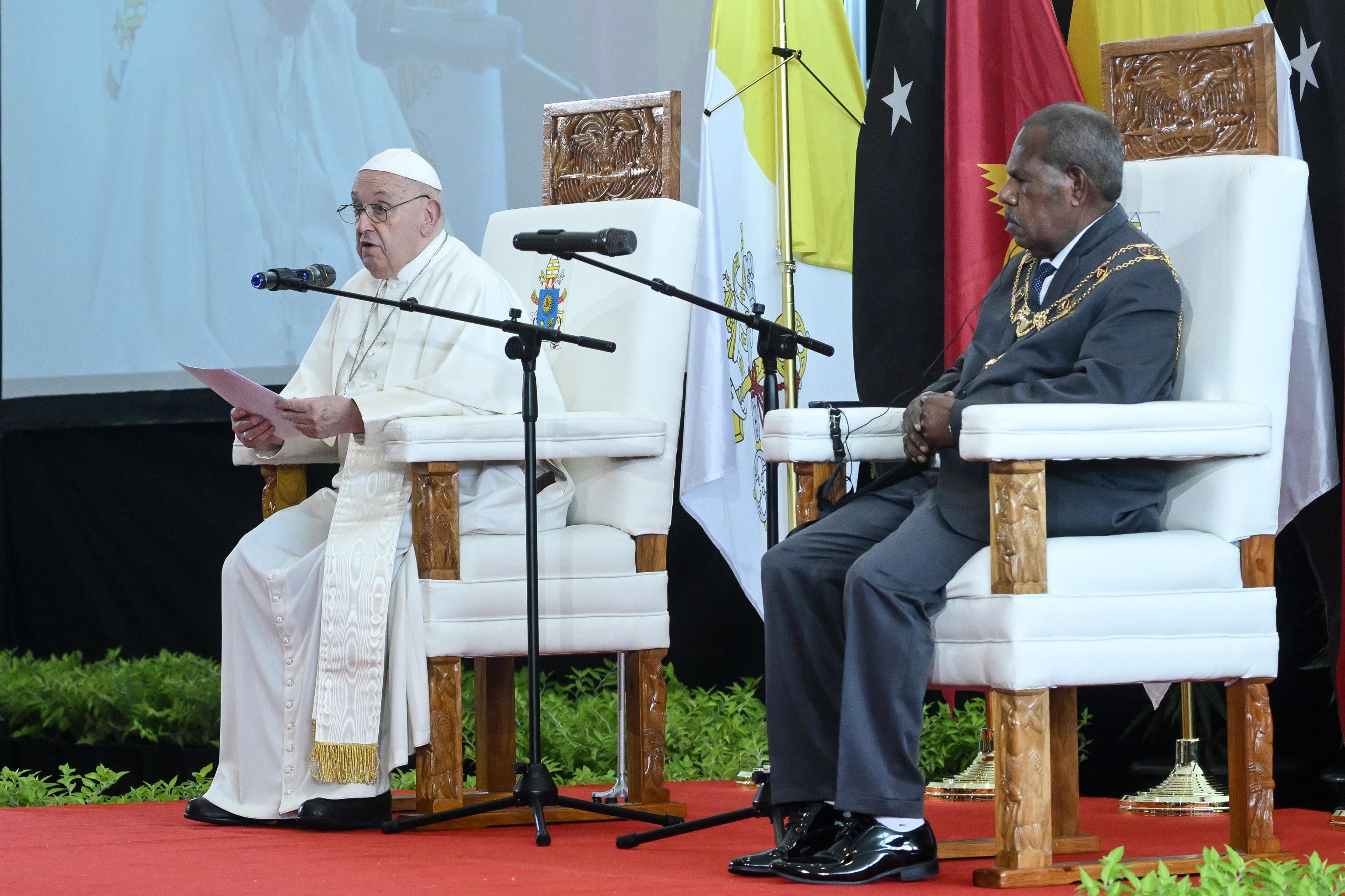 Pope Francis gives a speech in front of diplomats and dignitaries including the Governor General of Papua New Guinea Bob Dadae. Photo: EPA-EFE