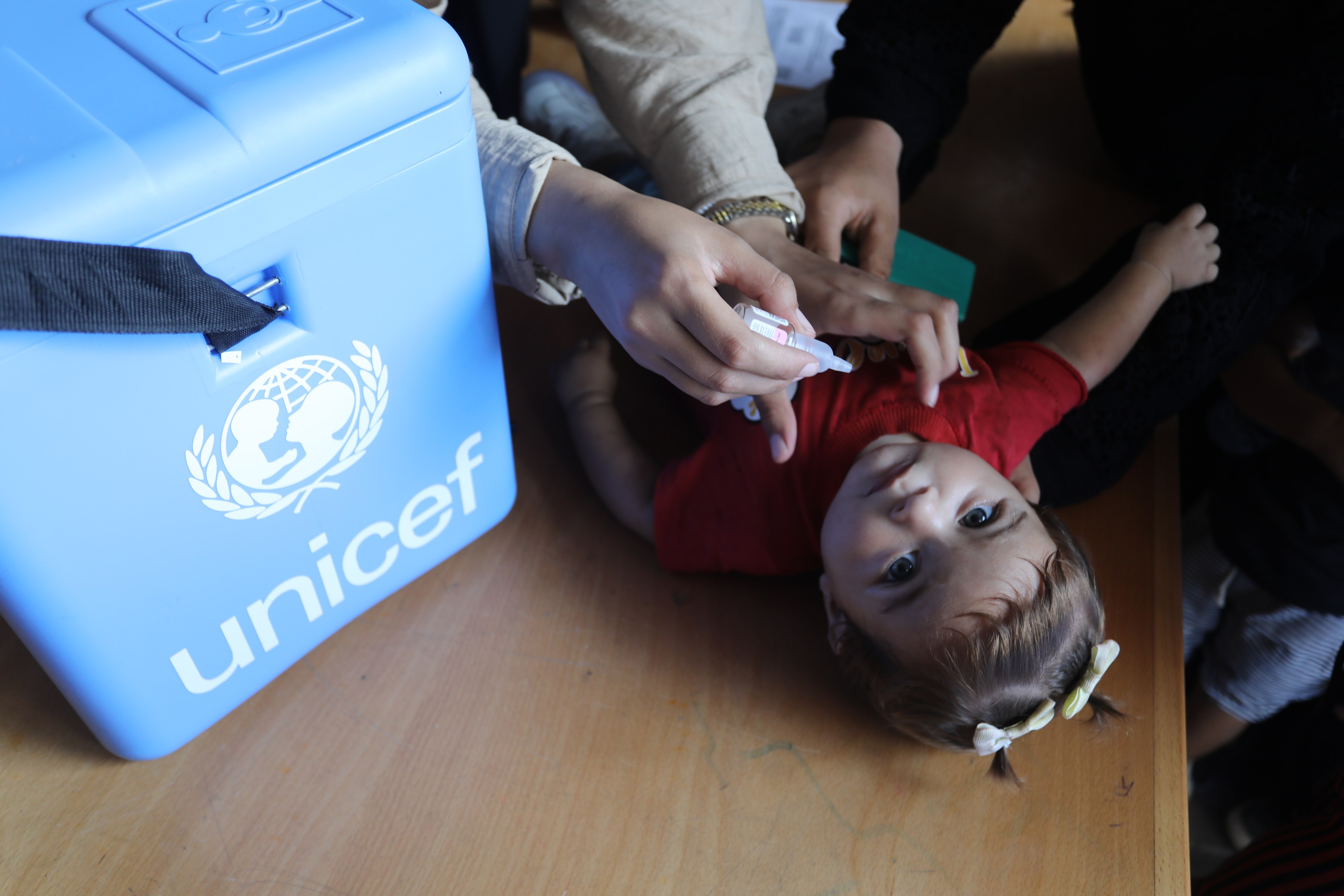 A child gets vaccinated against polio virus in Deir El Balah Health Center, Deir El Balah, West Bank, on September 01, 2024. Hundreds of thousands of children are being vaccinated during humanitarian pauses in israel’s bombing campaign. Photo: DPA