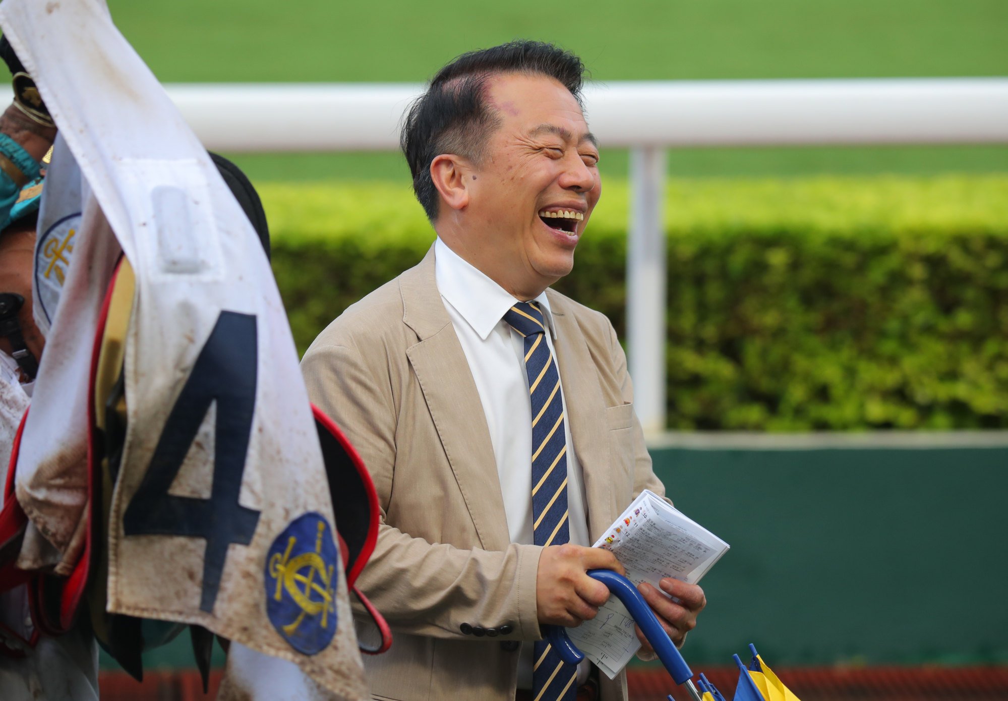 Veteran handler Ricky Yiu enjoys a laugh last season.