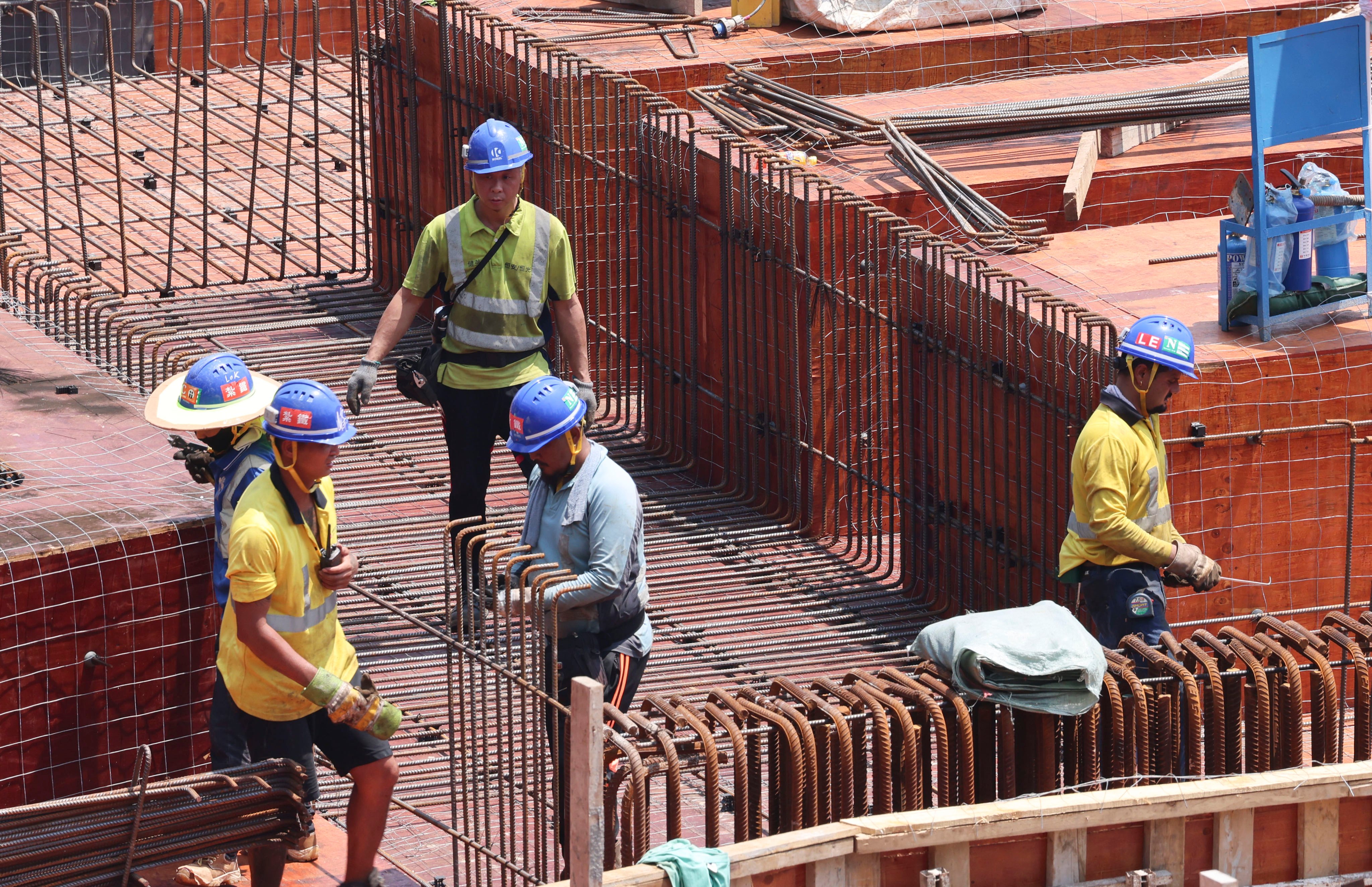 scmp.com - Ambrose Li - Hong Kong suspends construction labour import scheme amid alleged exploitation