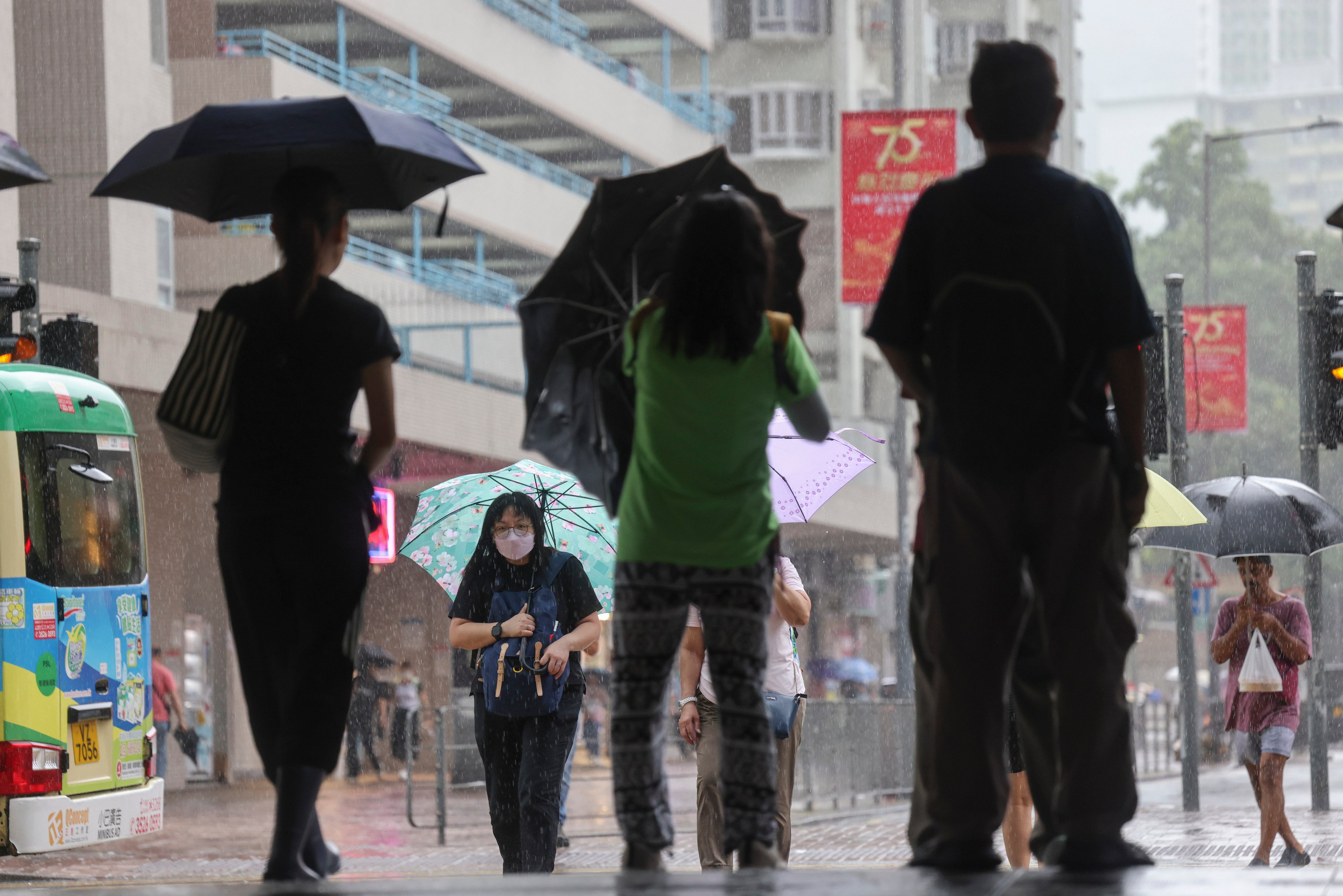 People rush to Tai Wai Station in heavy rain and wind as Typhoon Yagi moves away from Hong Kong. Photo: Jelly Tse