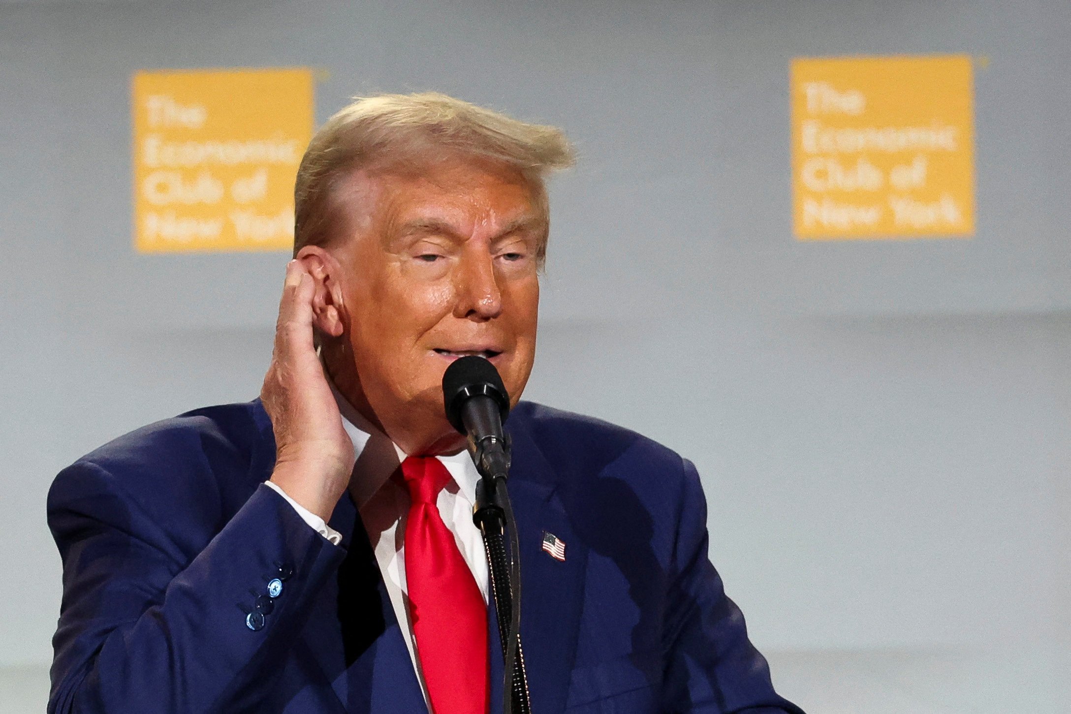 Former US president Donald Trump gestures as he speaks at the Economic Club of New York on Thursday. Photo: Reuters