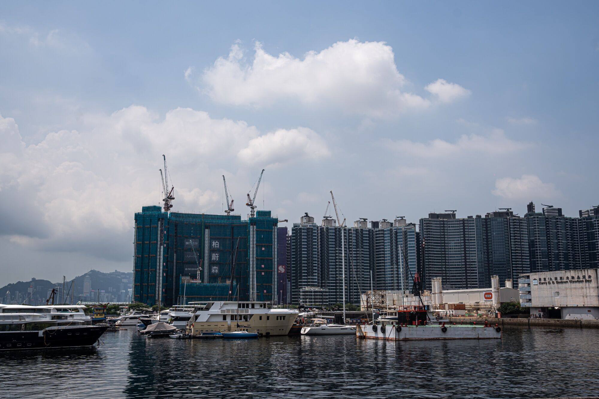 Residential buildings under construction are seen in Kai Tak on September 2. From the point of view of potential buyers, if a price war is just starting, why not wait a bit longer to see who will cut next and by how much? Photo: Bloomberg