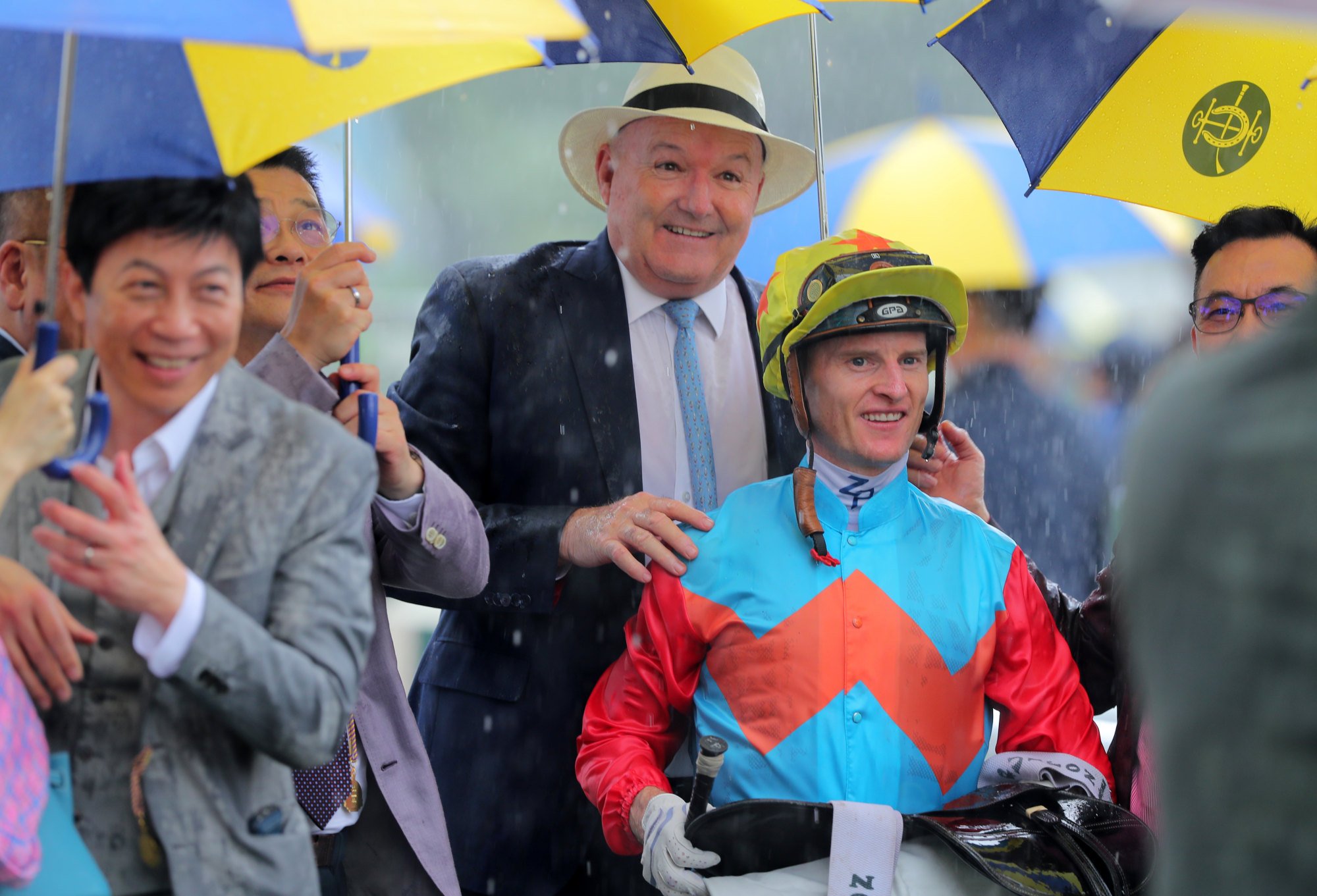 David Hayes and Zac Purton celebrate with Ka Ying Rising’s connections.