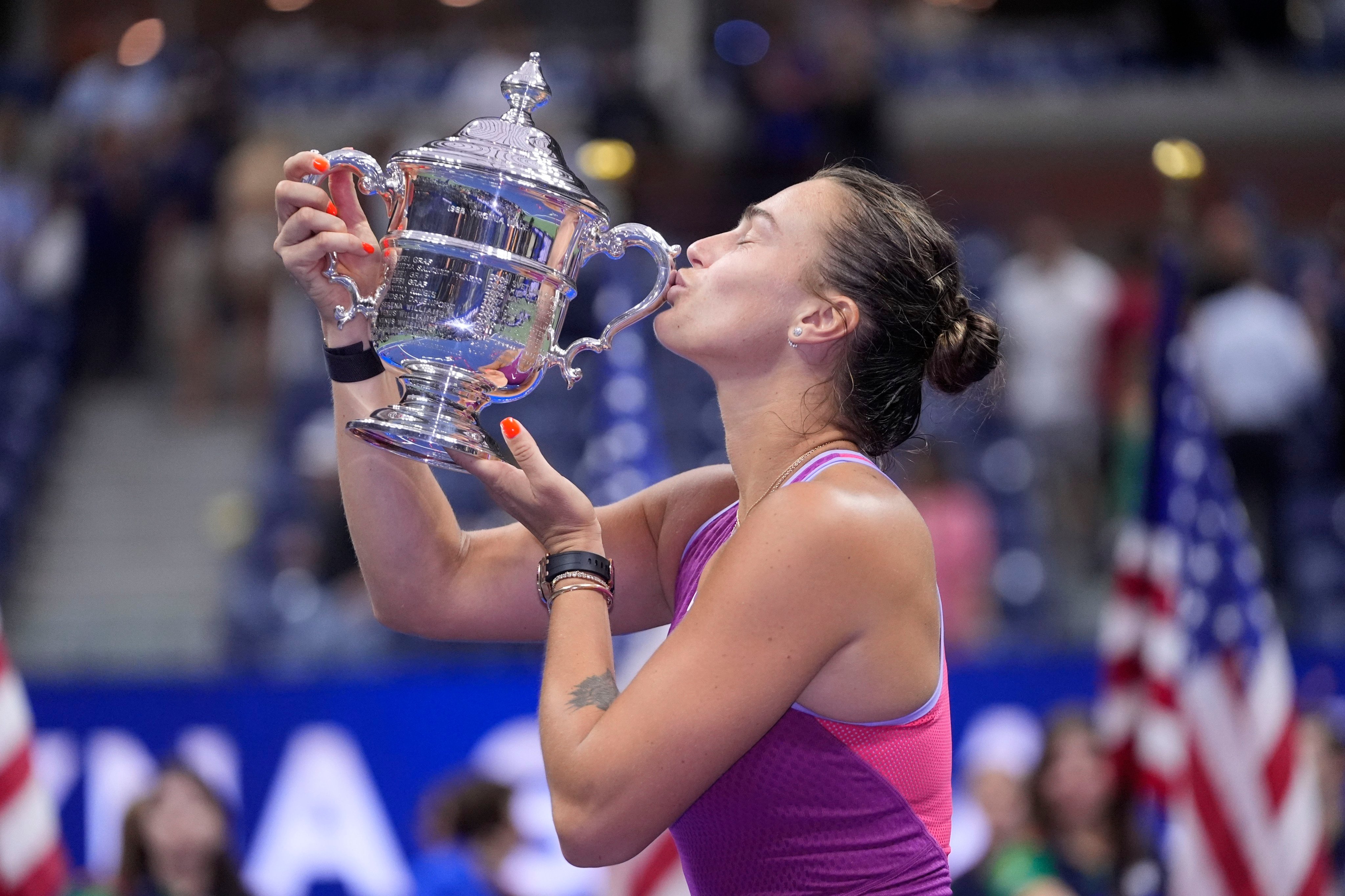 Aryna Sabalenka kisses the trophy after winning the women’s singles final at the US Open. Photo: AP