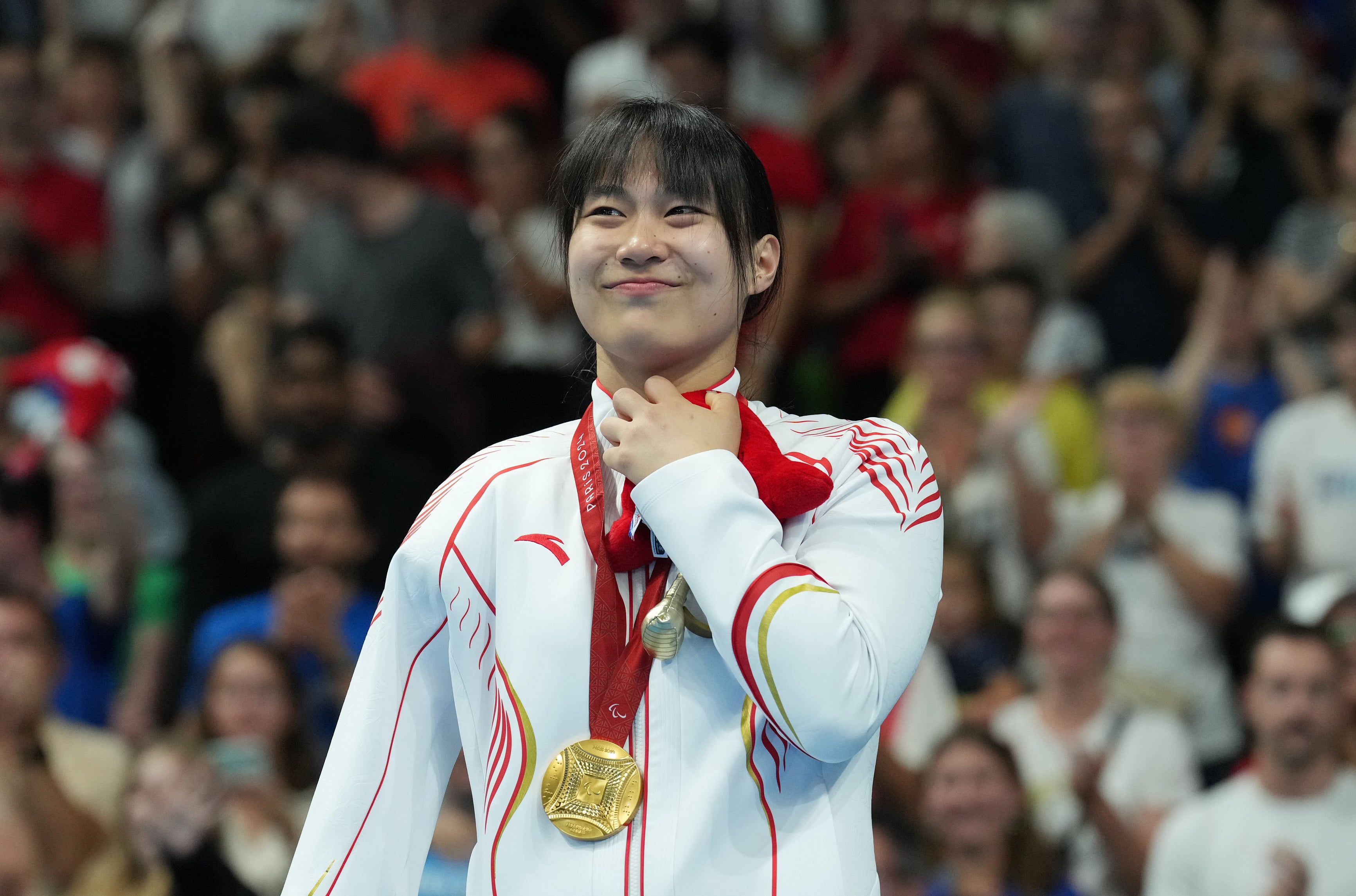 Chinese teenager Jiang Yuyan has won seven gold medals at the Paris Paralympics and set a world record in the 100m backstroke S6 but has barely had any attention online. Photo: Xinhua