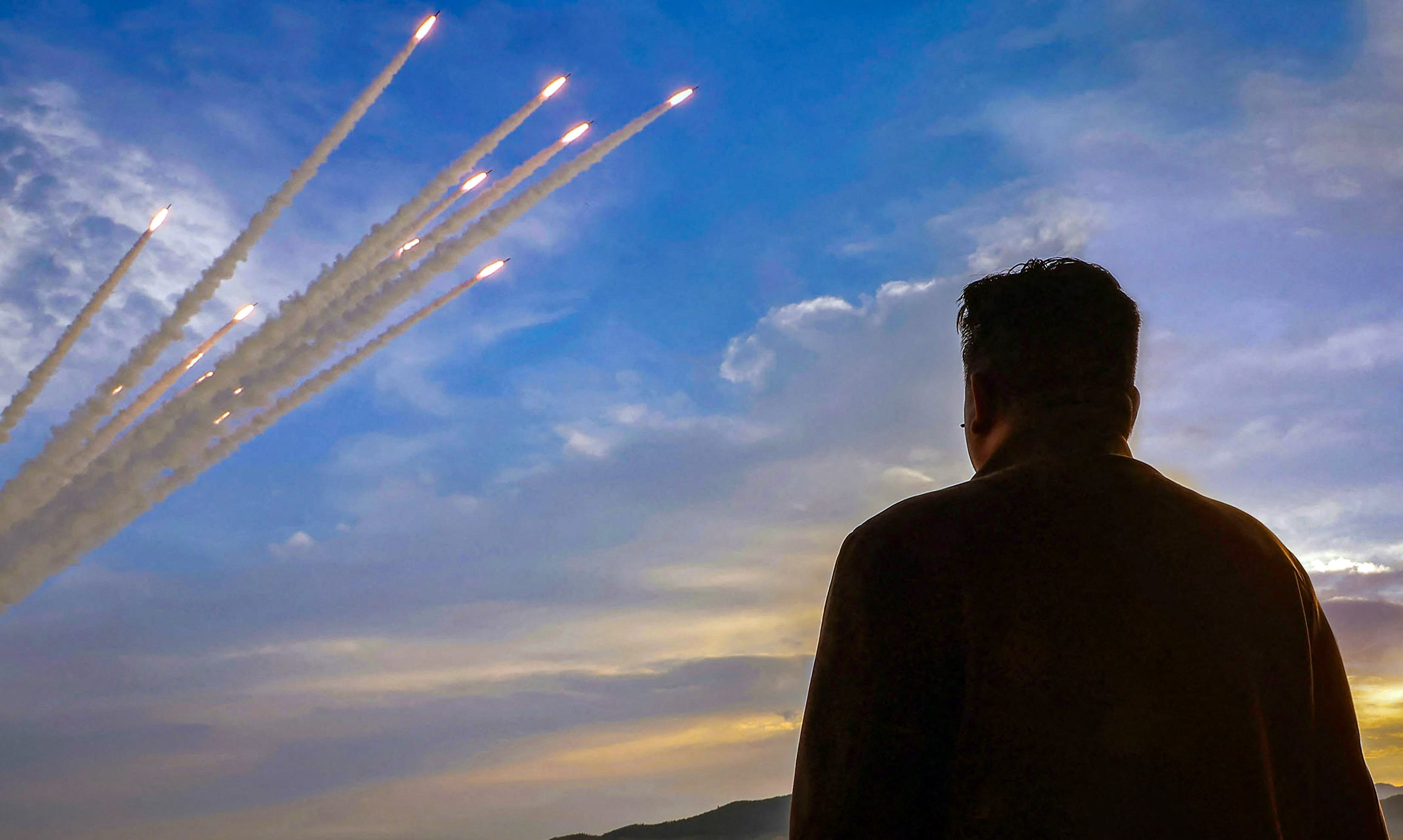 North Korean leader Kim Jong-un watches the test firing of a projectile barrage earlier this year. Photo: KCNA via KNS/AFP