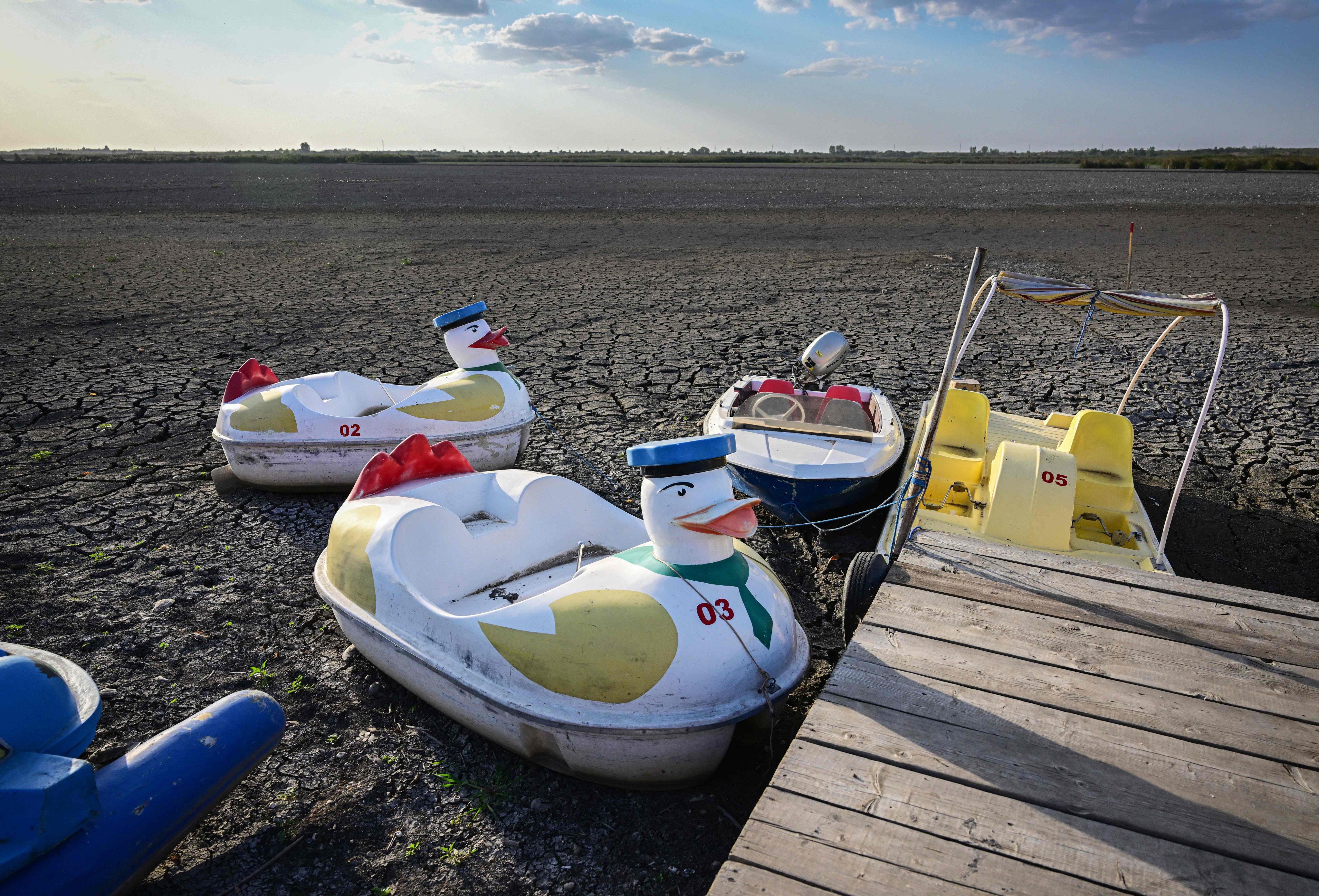 Pedal boats are seen on the bed of a dried out lake in the village of Comana, Romania, on September 7. The EU’s Copernicus Climate Change Service has warned that it is “increasingly likely” 2024 will be the hottest year on record. Photo: AFP