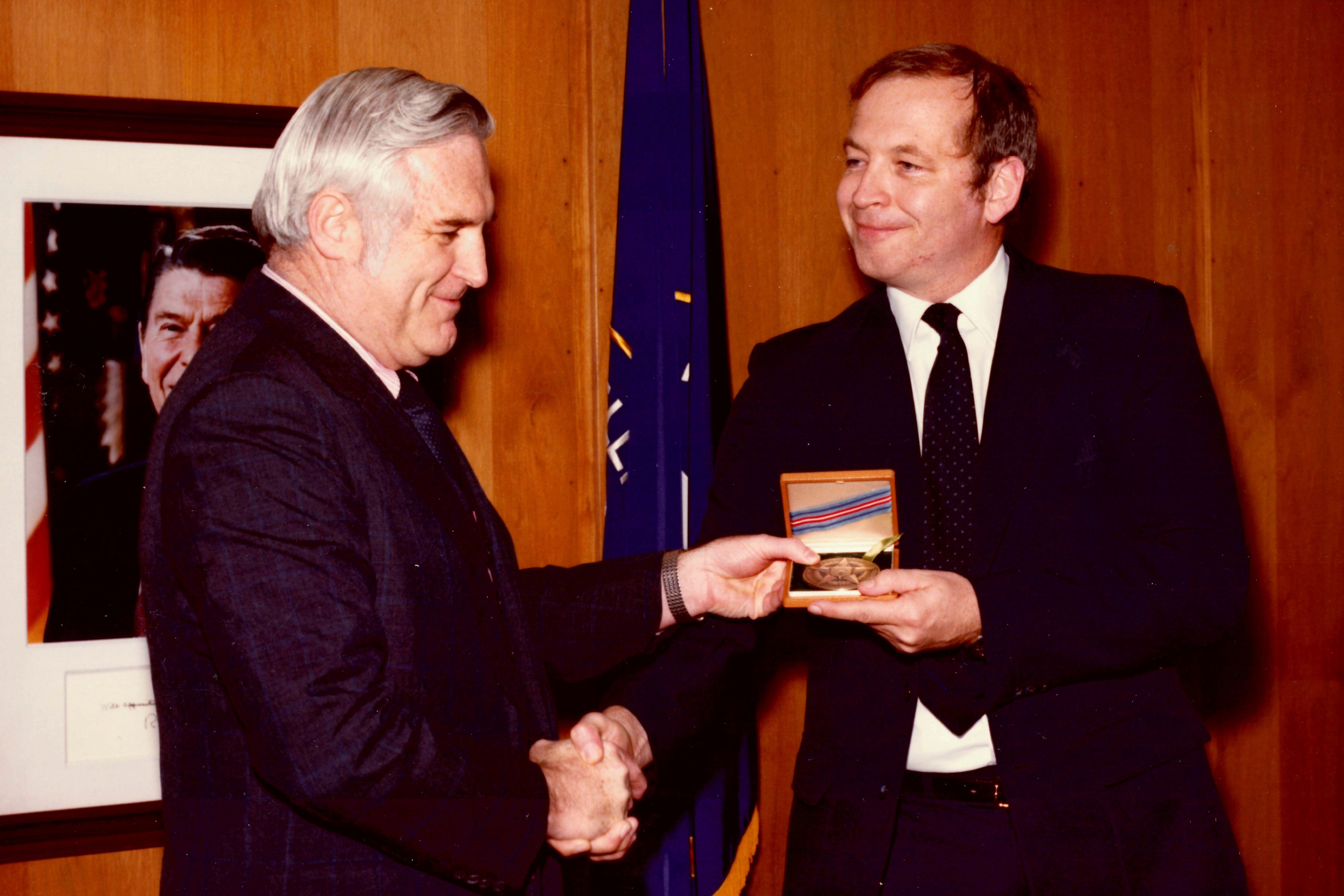 Edward B. Johnson, right, receives the CIA’s Intelligence Star from John N. McMahon, then the agency’s deputy director for operations, in 1980. File photo: Family of Edward B. Johnson / CIA via AP