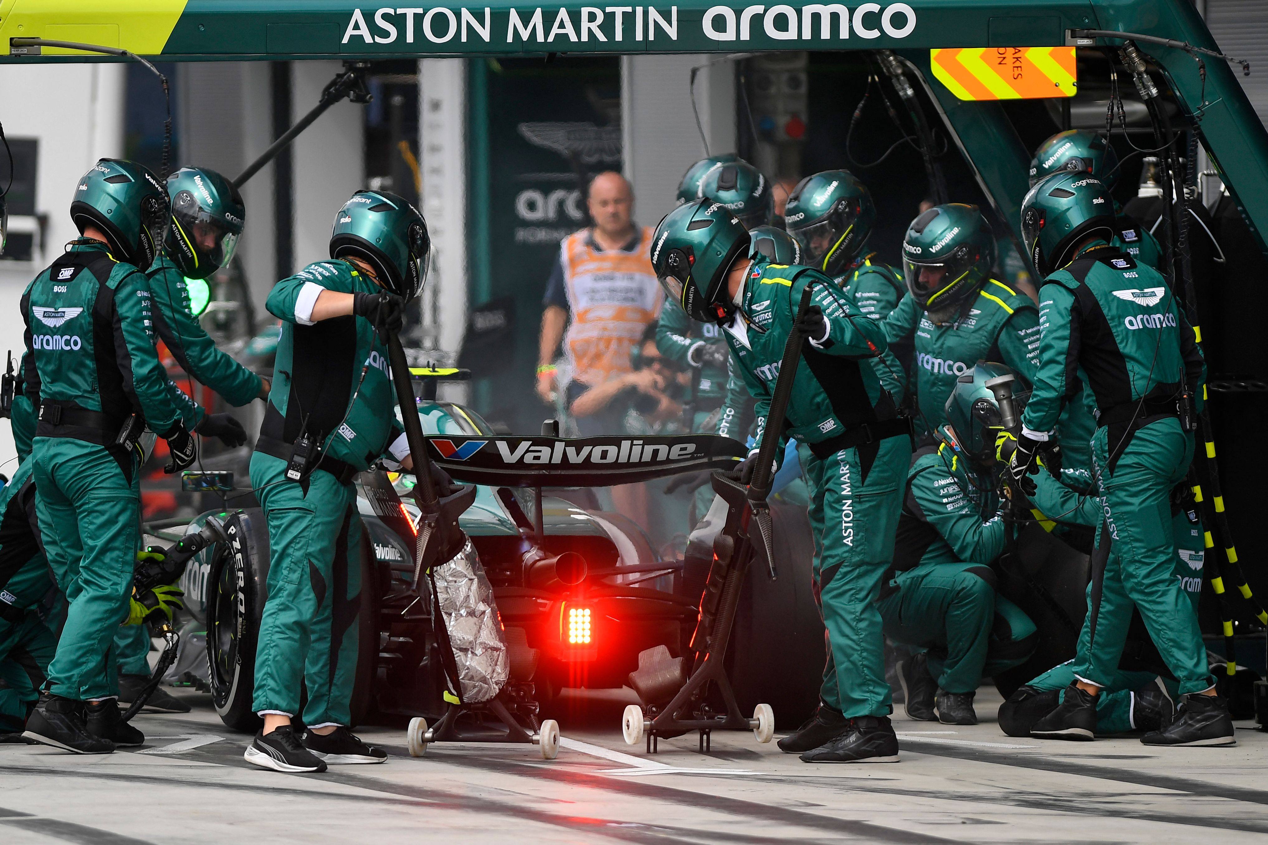 Aston Martin’s Spanish driver Fernando Alonso makes a pit stop during the Italian Grand Prix. Adrian Newey will join the team on March 1. Photo: AFP