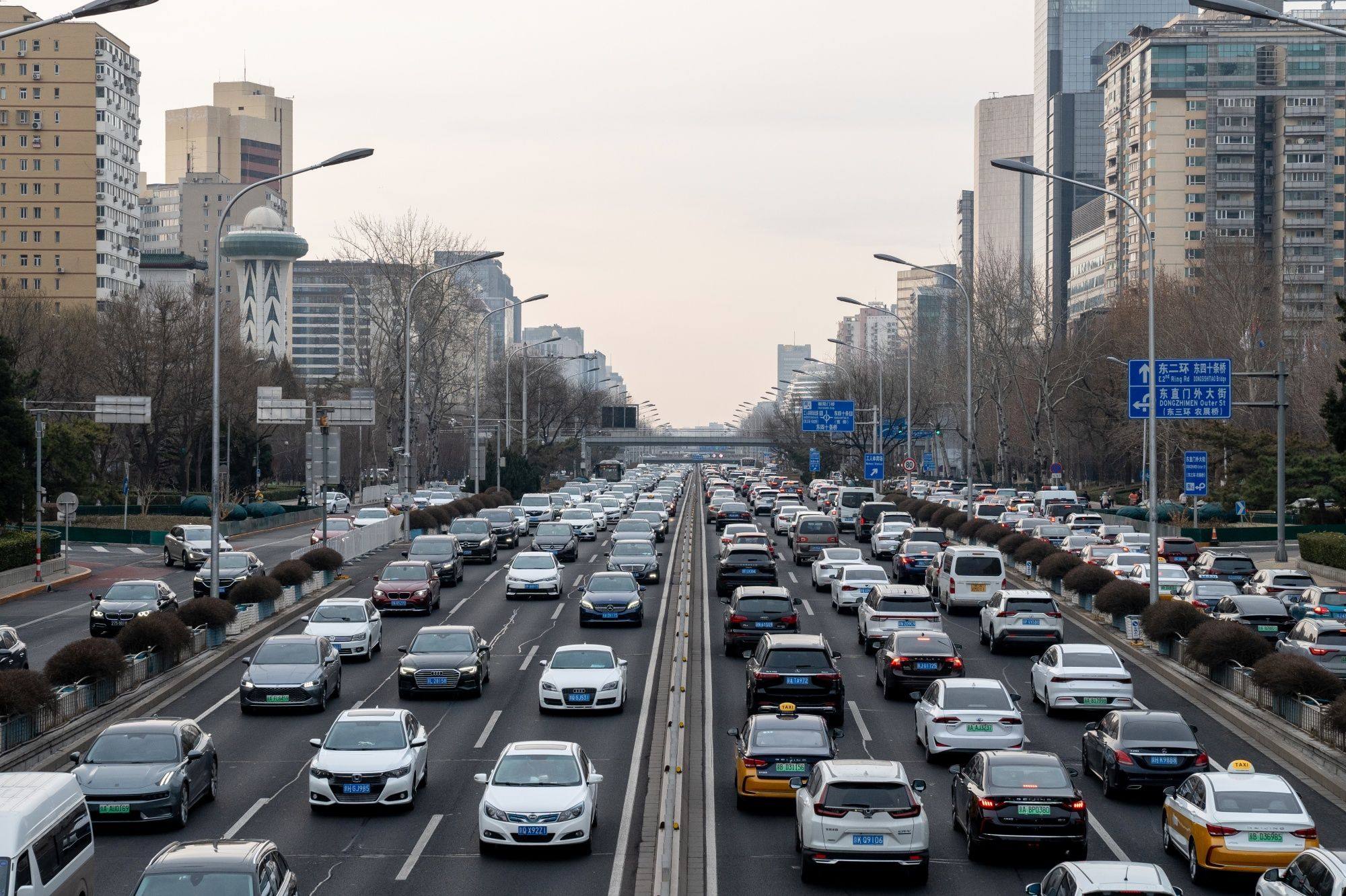 Vehicles travel along a road in Beijing on February 15, 2023. Photo: Bloomberg