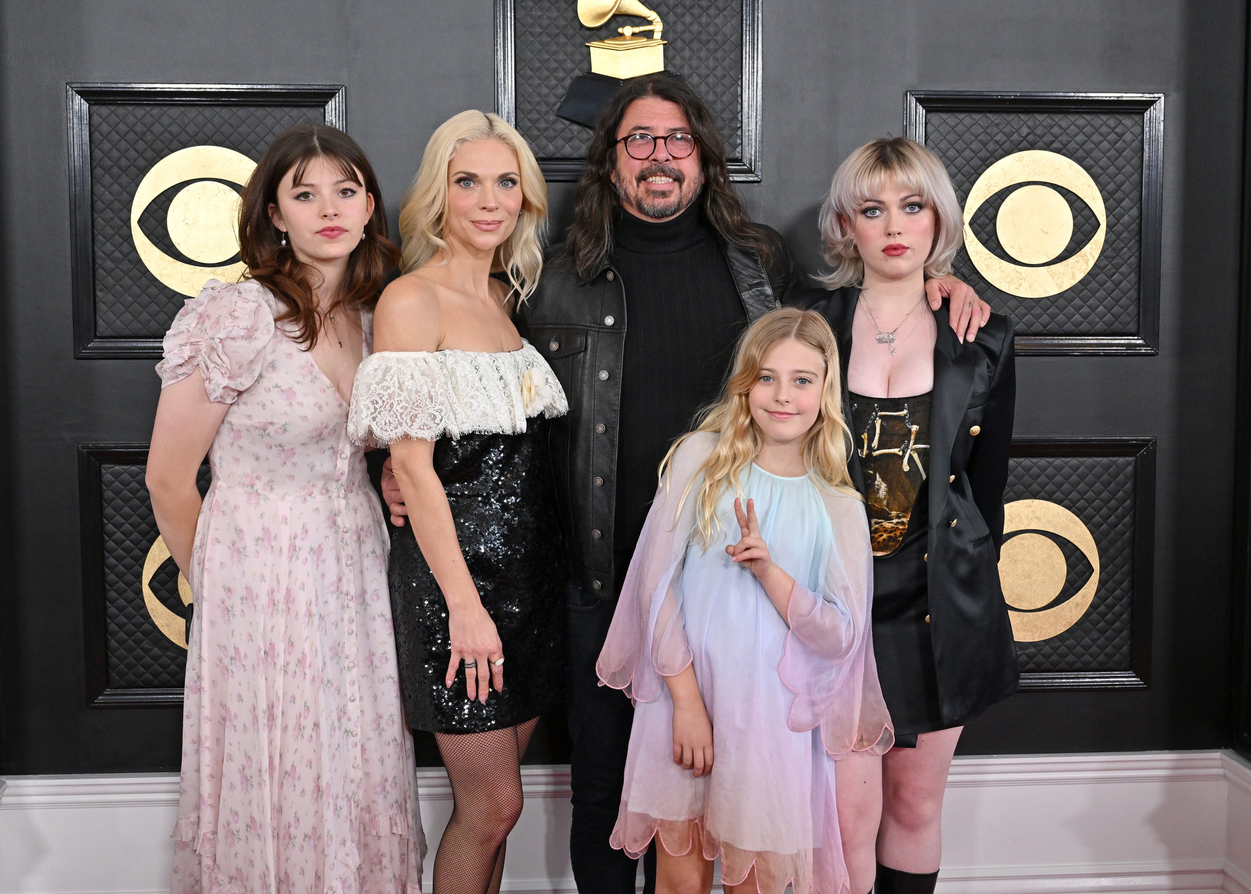 Dave Grohl with his wife Jordyn Blum and three daughters, Ophelia, Harper and Violet, at the 2023 Grammys. Photo: Getty Images