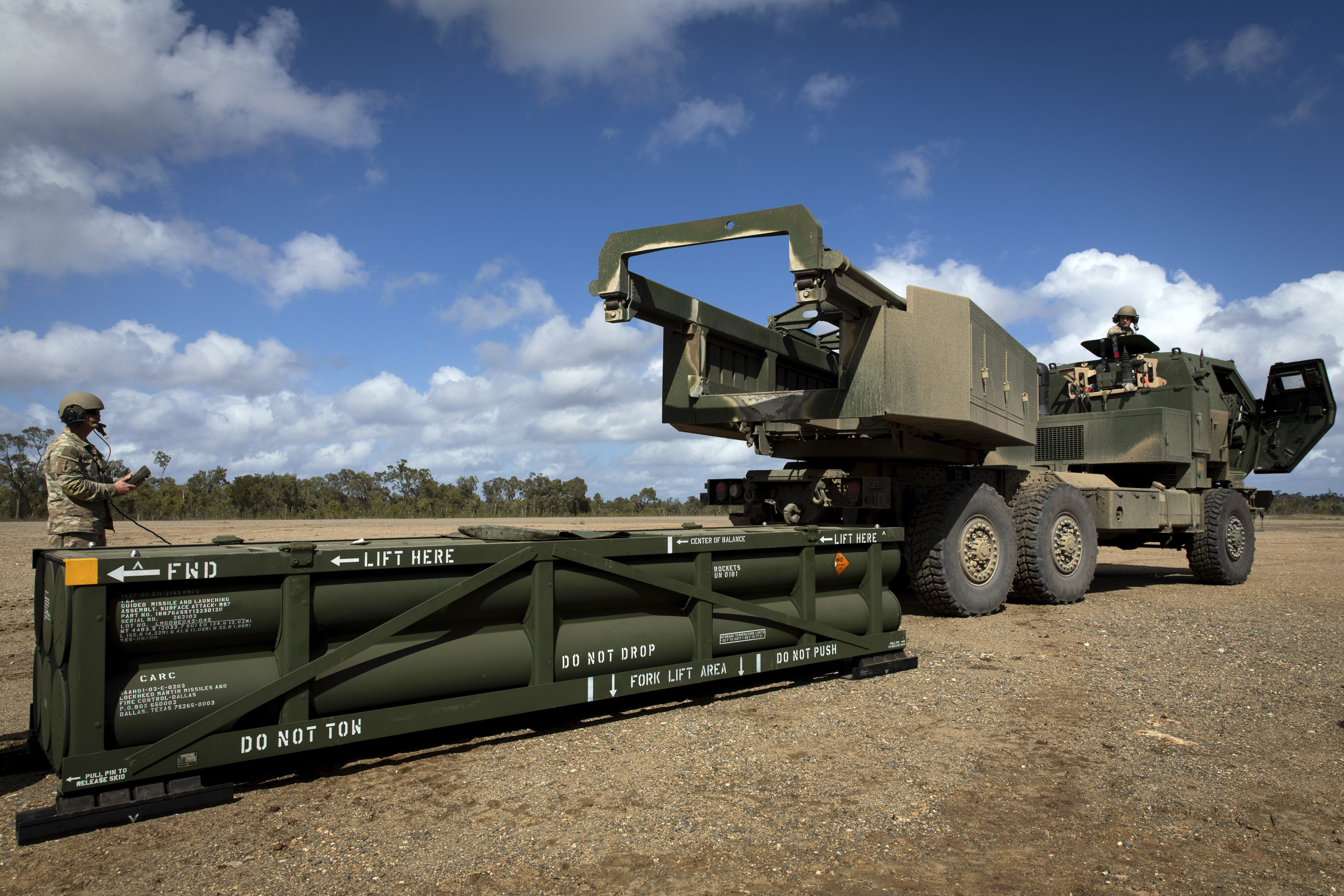 A US Army soldier prepares a crane for loading the Army Tactical Missile System on a High Mobility Artillery Rocket System in Queensland, Australia, in July 2023. Photo: US Army via AP