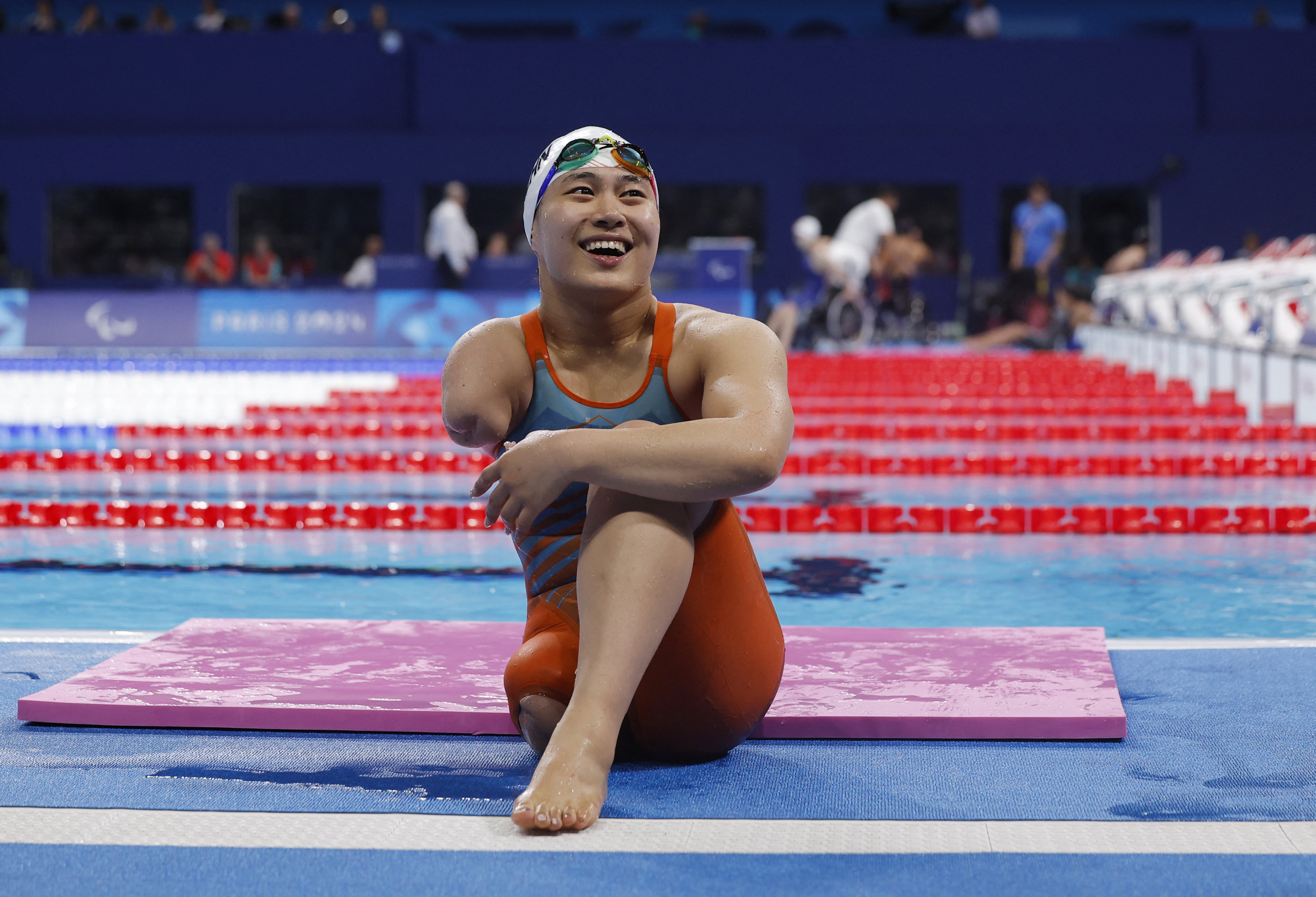 Chinese Paralympian Jiang Yuyan reacts to the results of the women’s 400m freestyle race in Paris, France. Photo: Reuters
